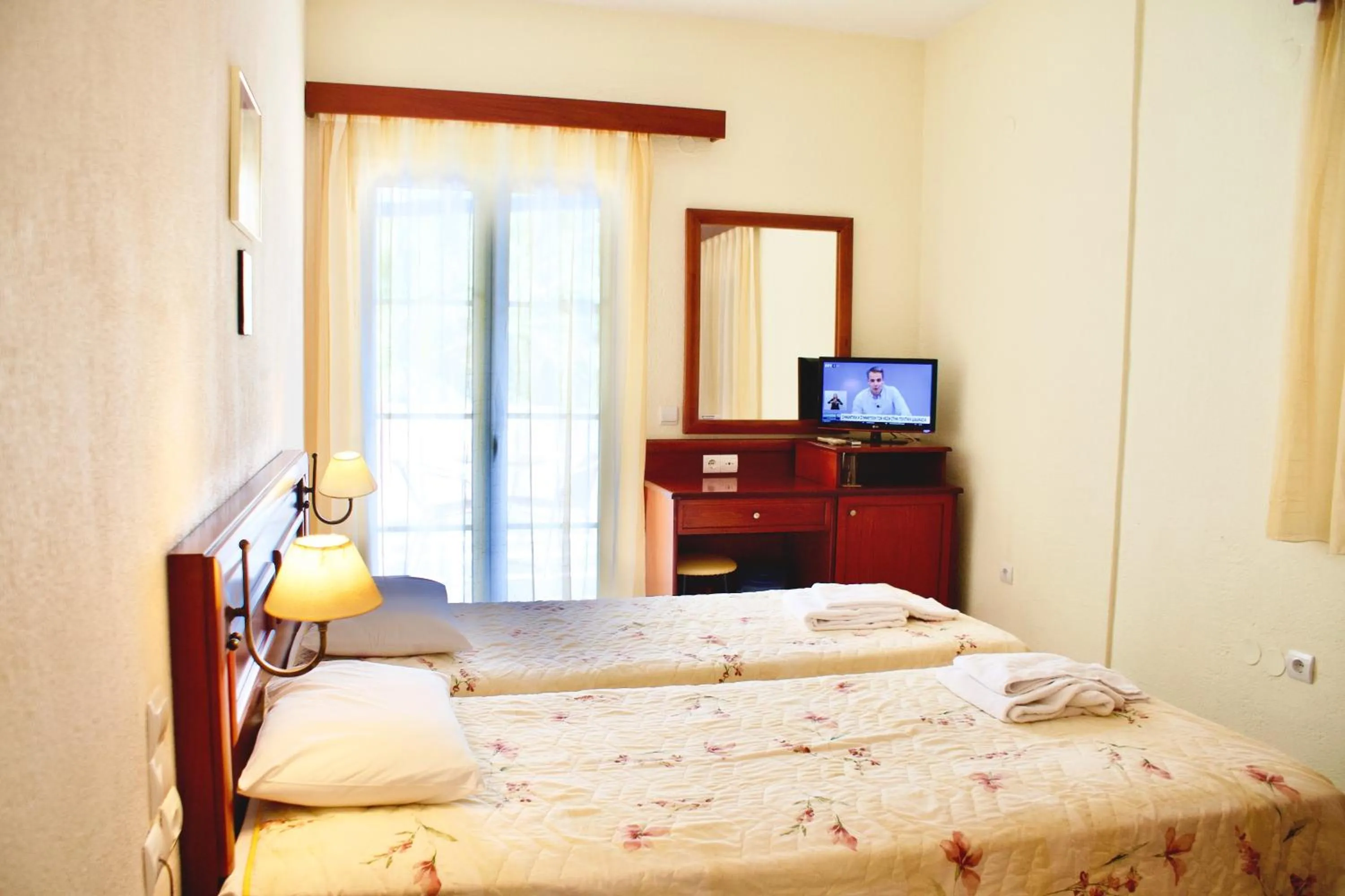 Bed in Venardos Hotel