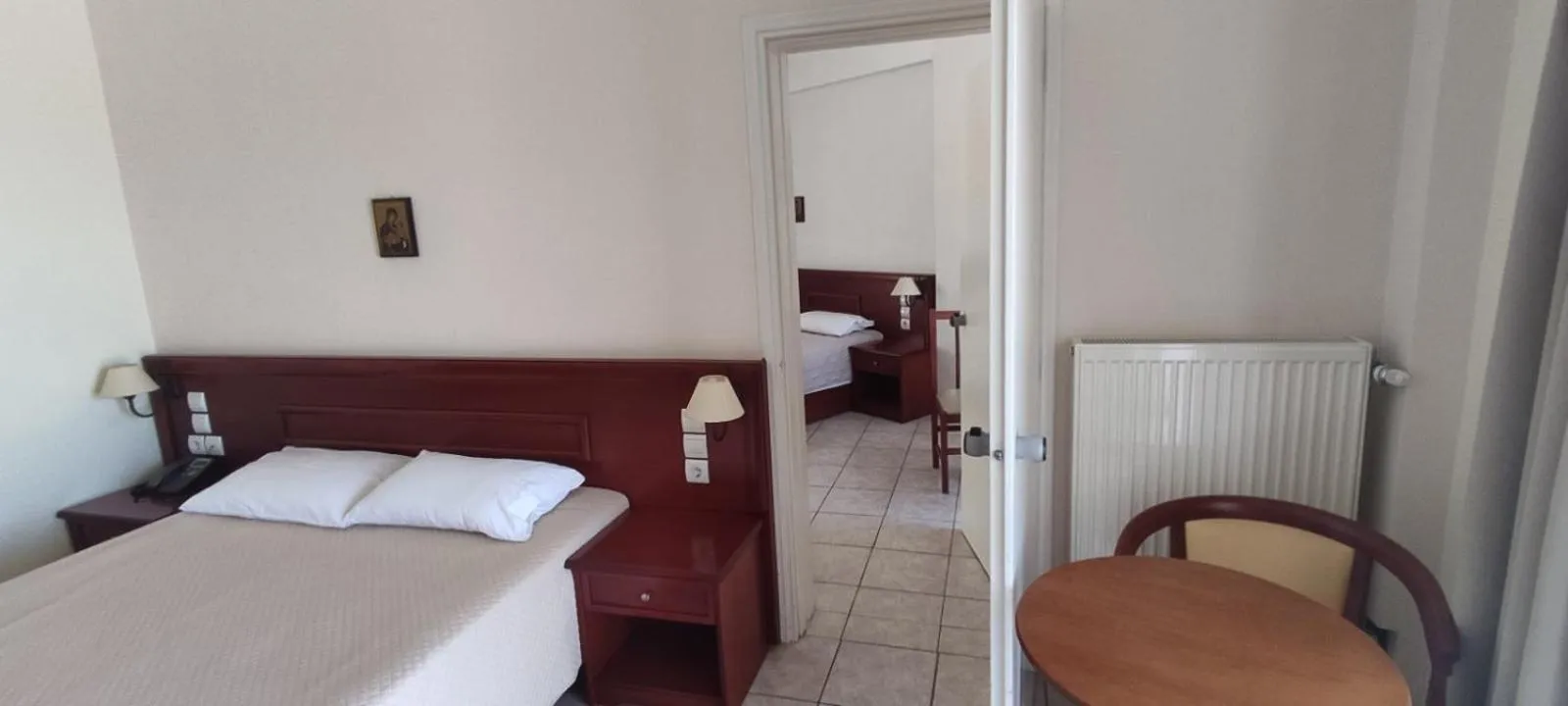 Bed in Venardos Hotel