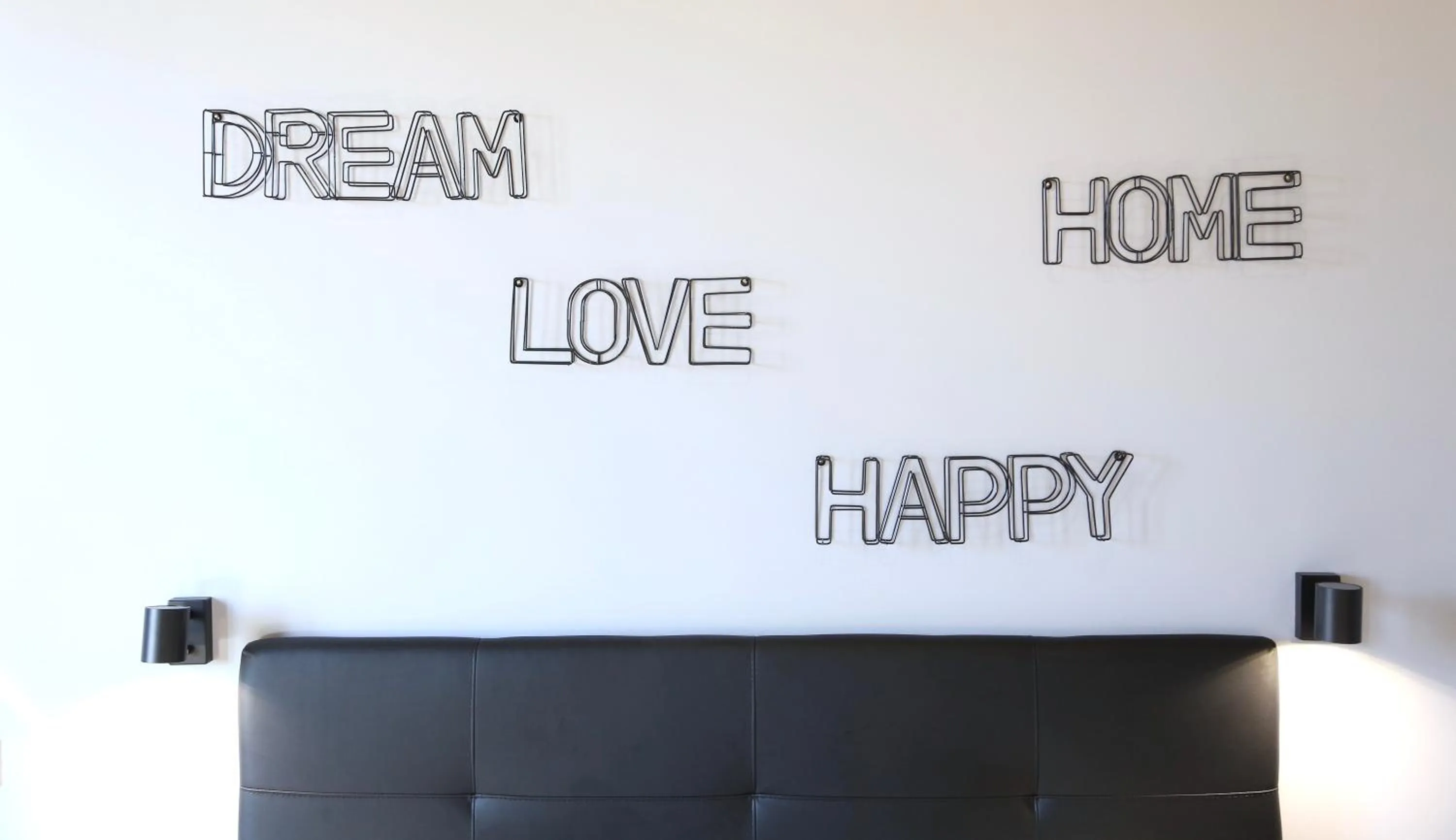 Bed in KISS ME ROME Luxury Rooms