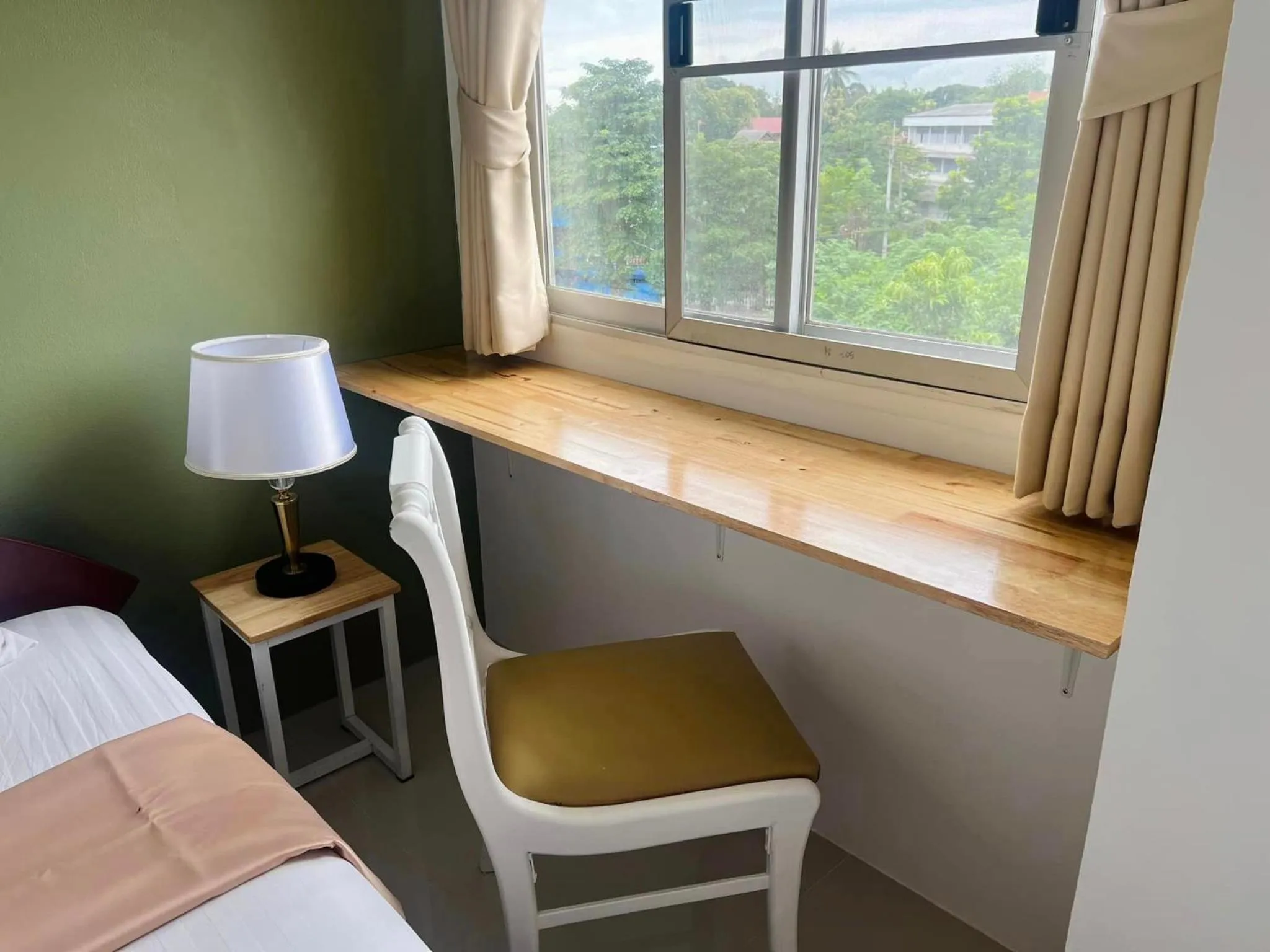 Bed in Regent Lodge Lampang