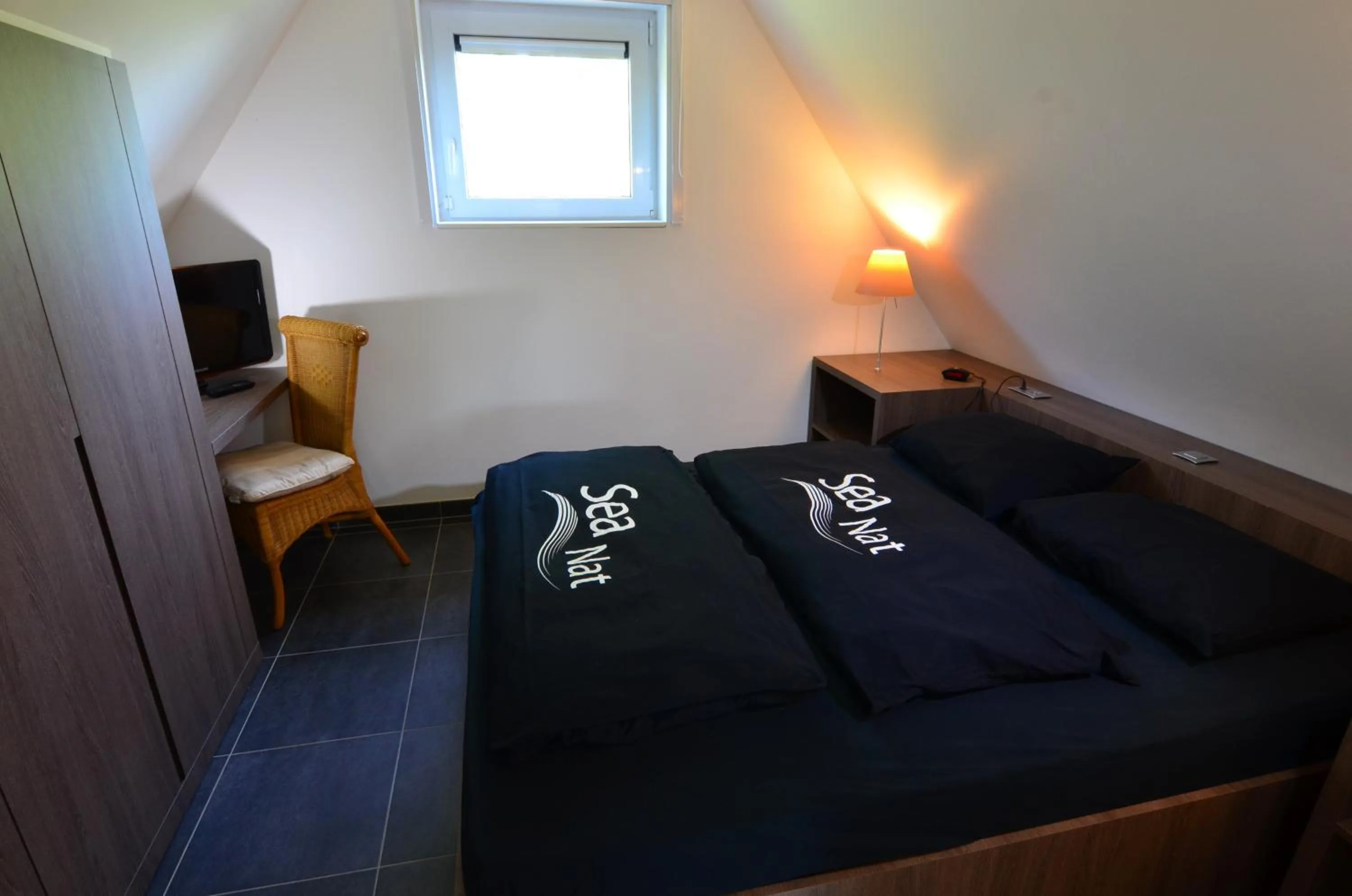 Bed in B&B wellness Sea Nat voor Naturisten