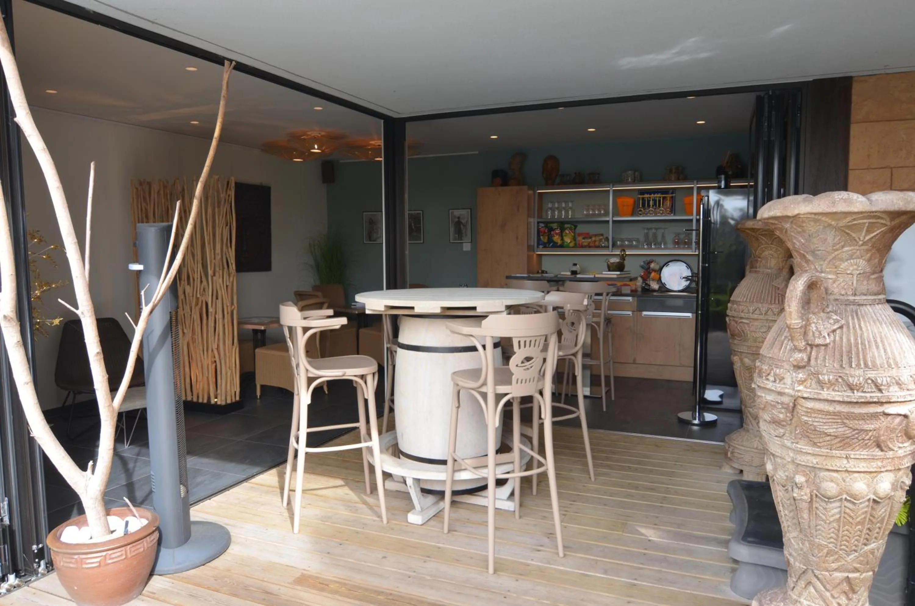 Communal lounge/ TV room in B&B wellness Sea Nat voor Naturisten