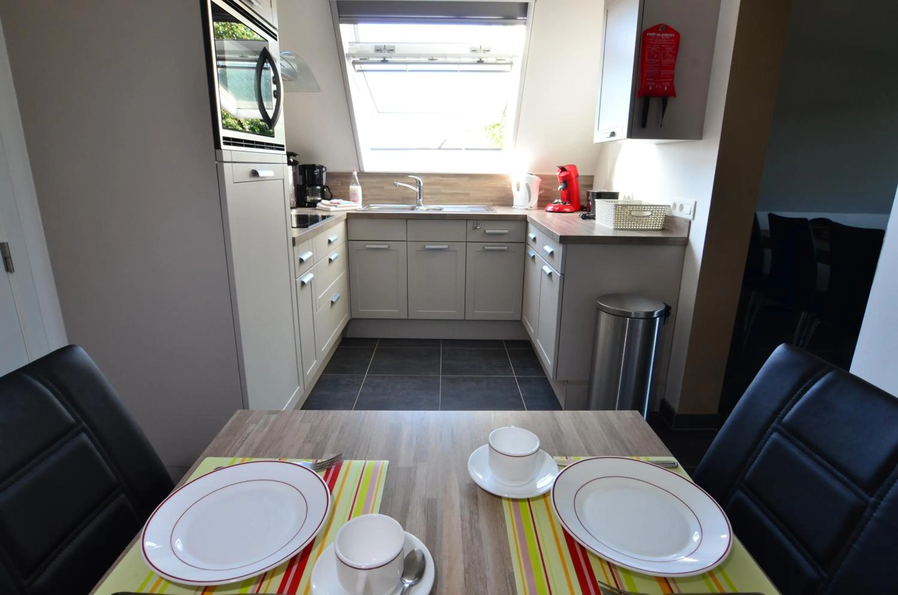 Kitchen or kitchenette in B&B wellness Sea Nat voor Naturisten