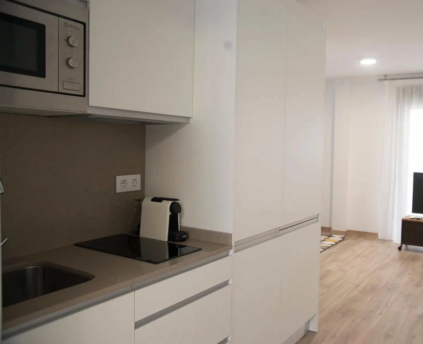 Kitchen or kitchenette in Apartamentos Core Suite Sevilla