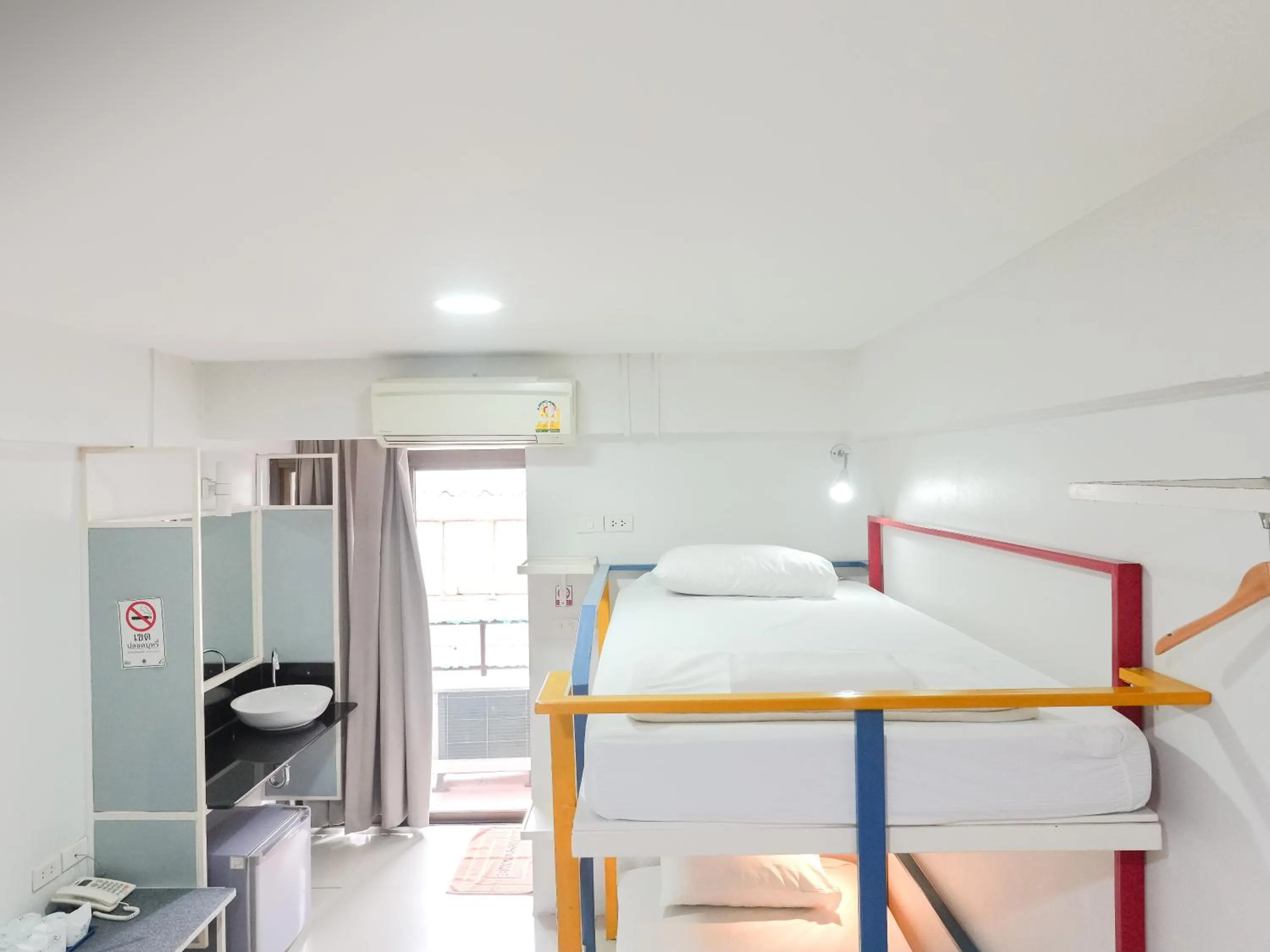 Bed in Regent Ngamwongwan Hotel