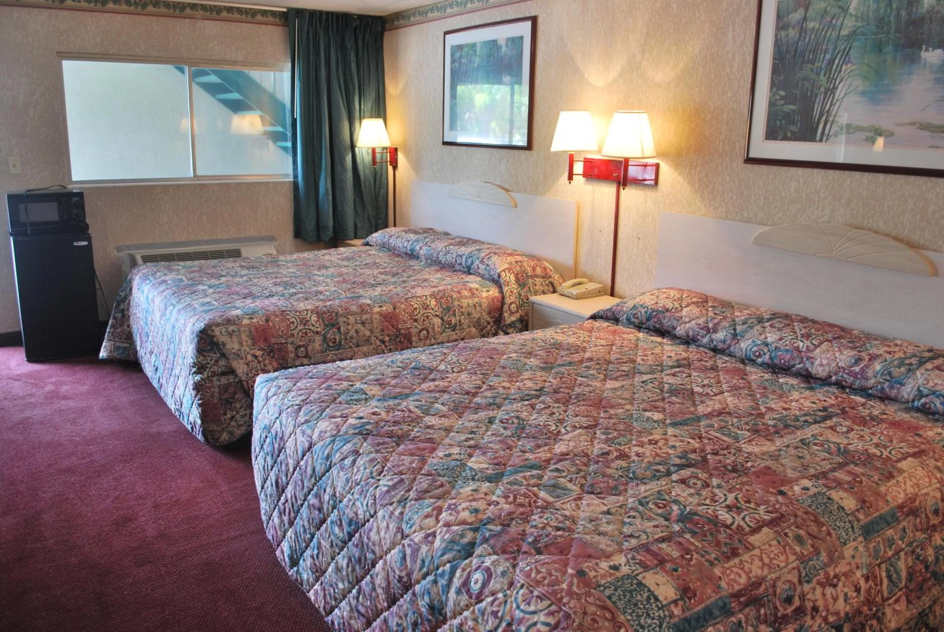 Bedroom, Bed in Best Motel Lakeland