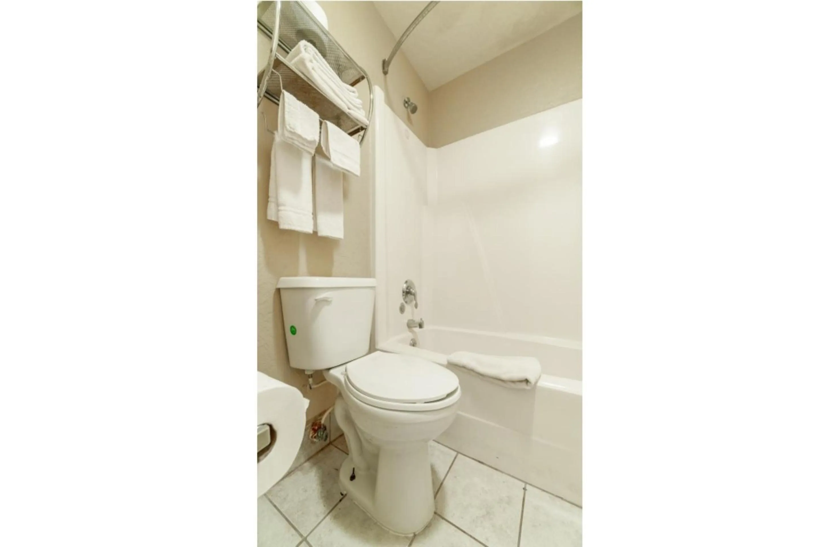 Bathroom in Stamford Inn By OYO