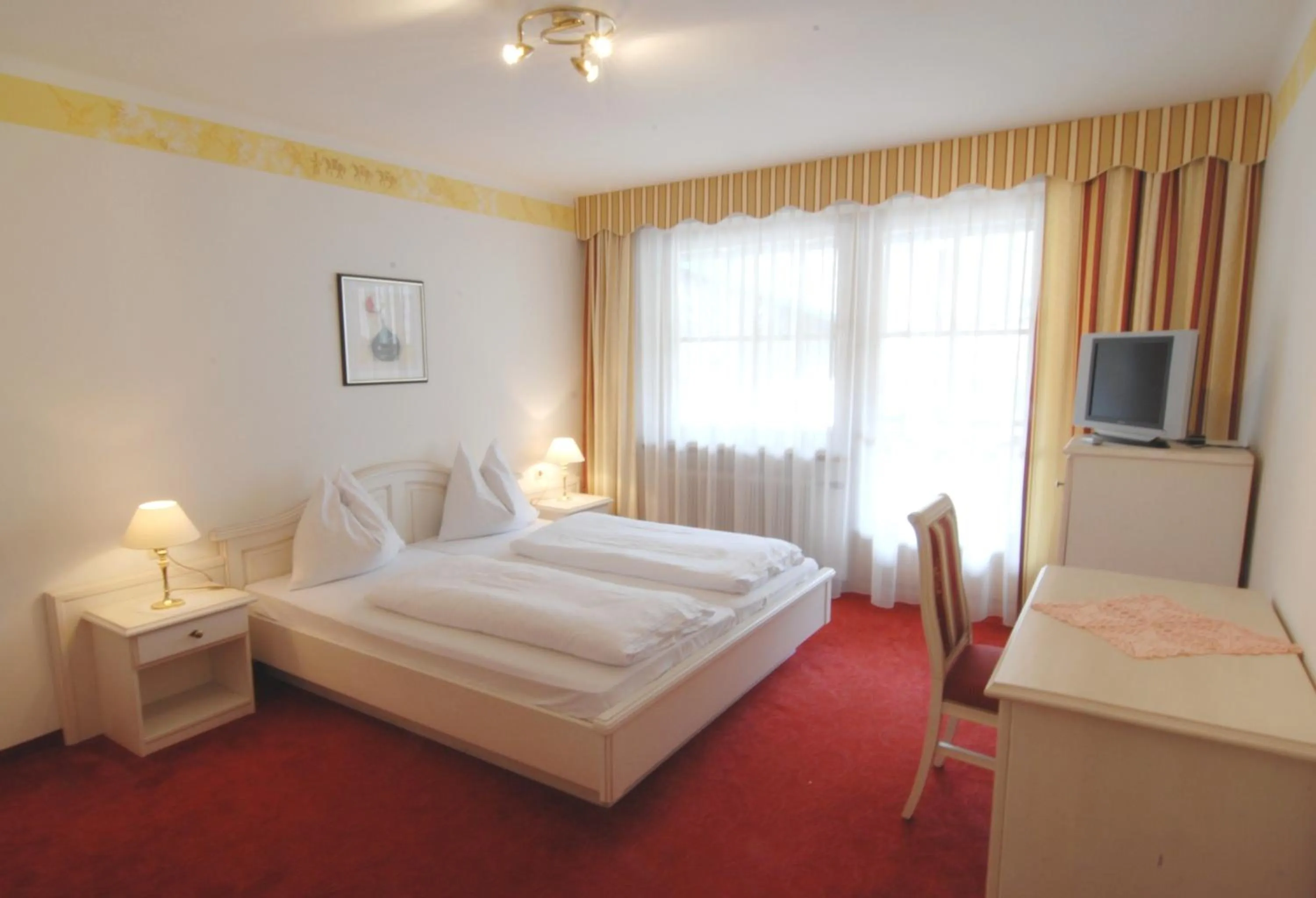 Bed in Gasthof Andrelwirt Rauris