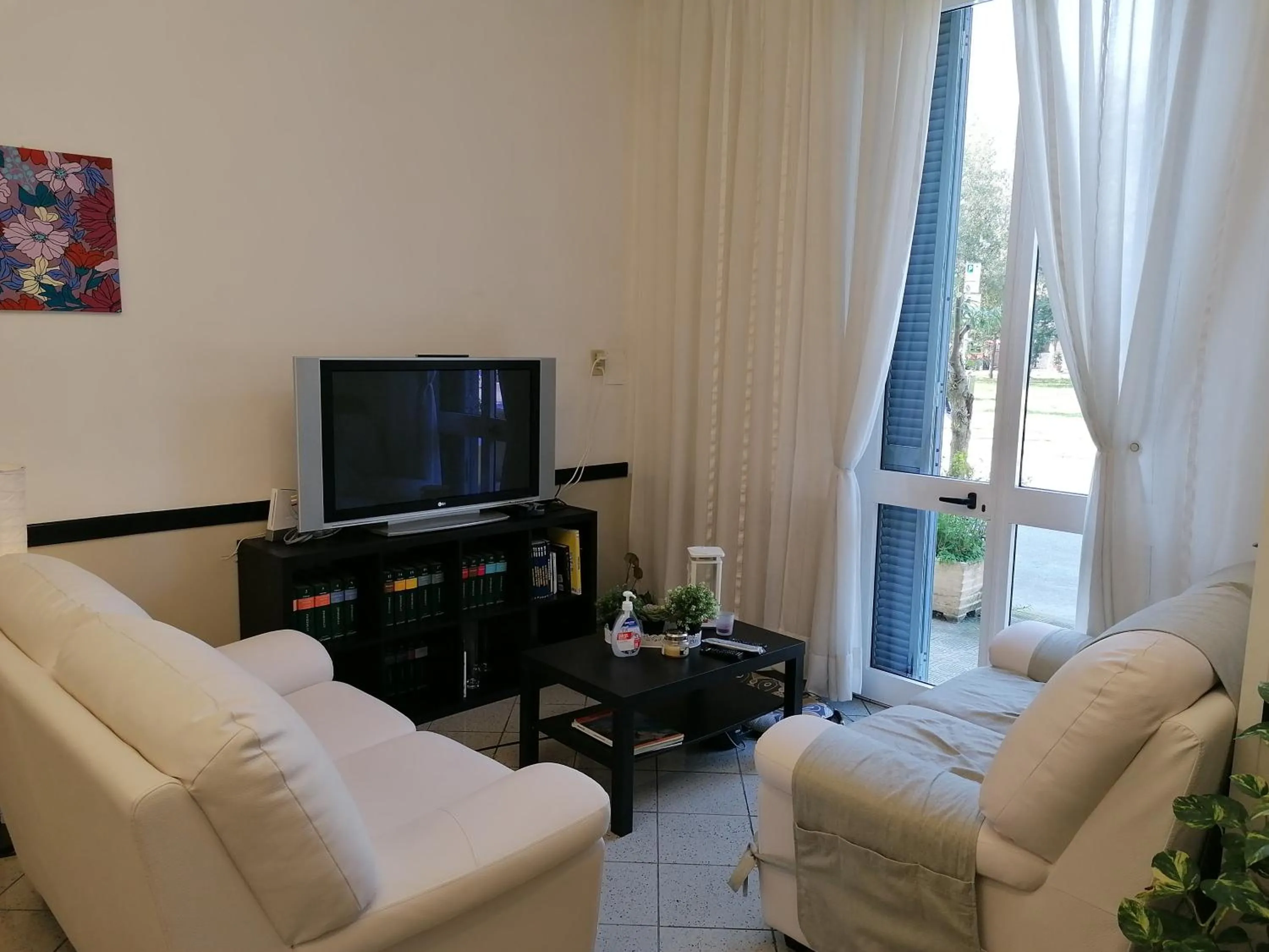 Communal lounge/ TV room in Hotel Cilene