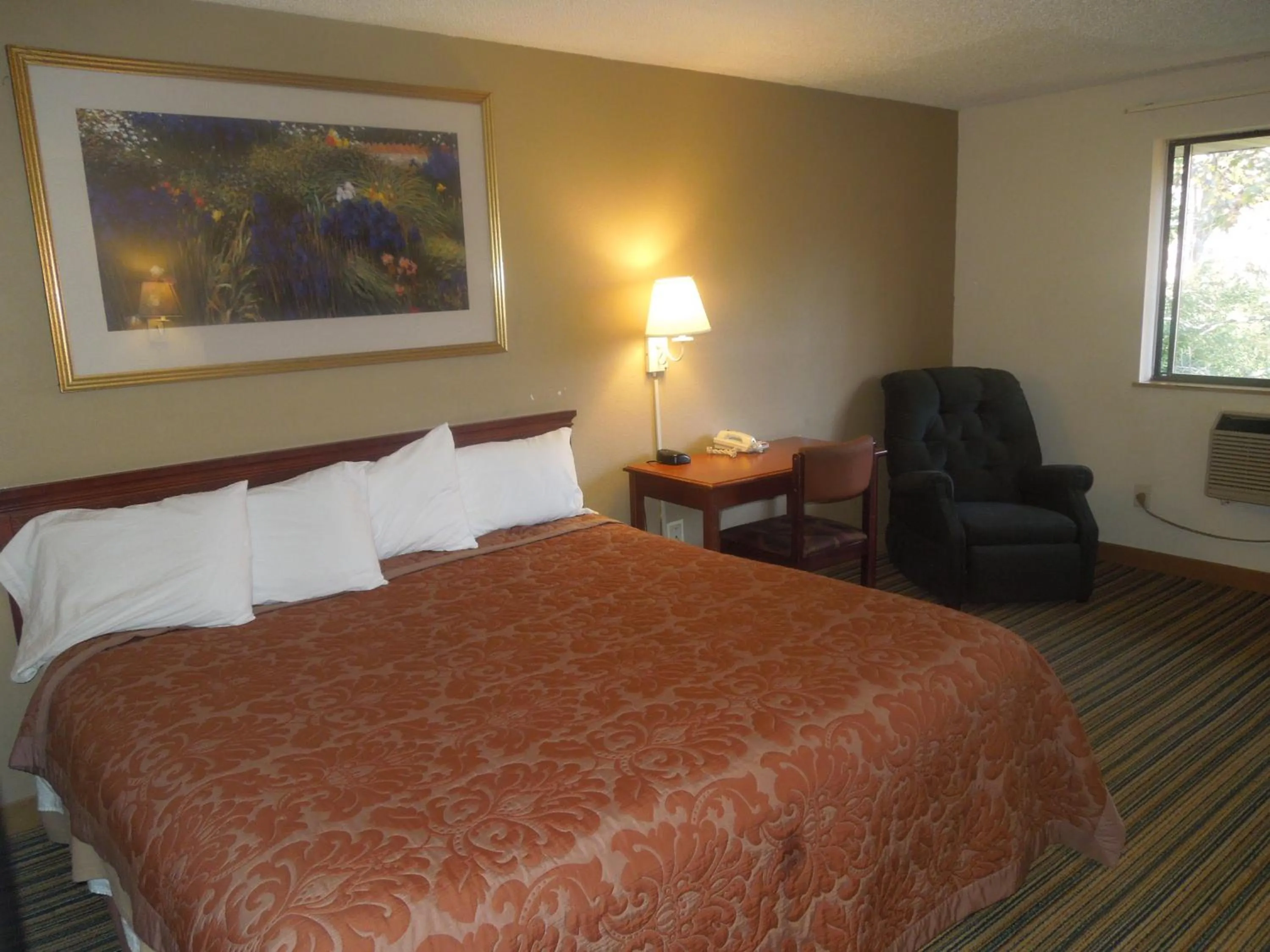 Bed in Super 8 by Wyndham Waldorf