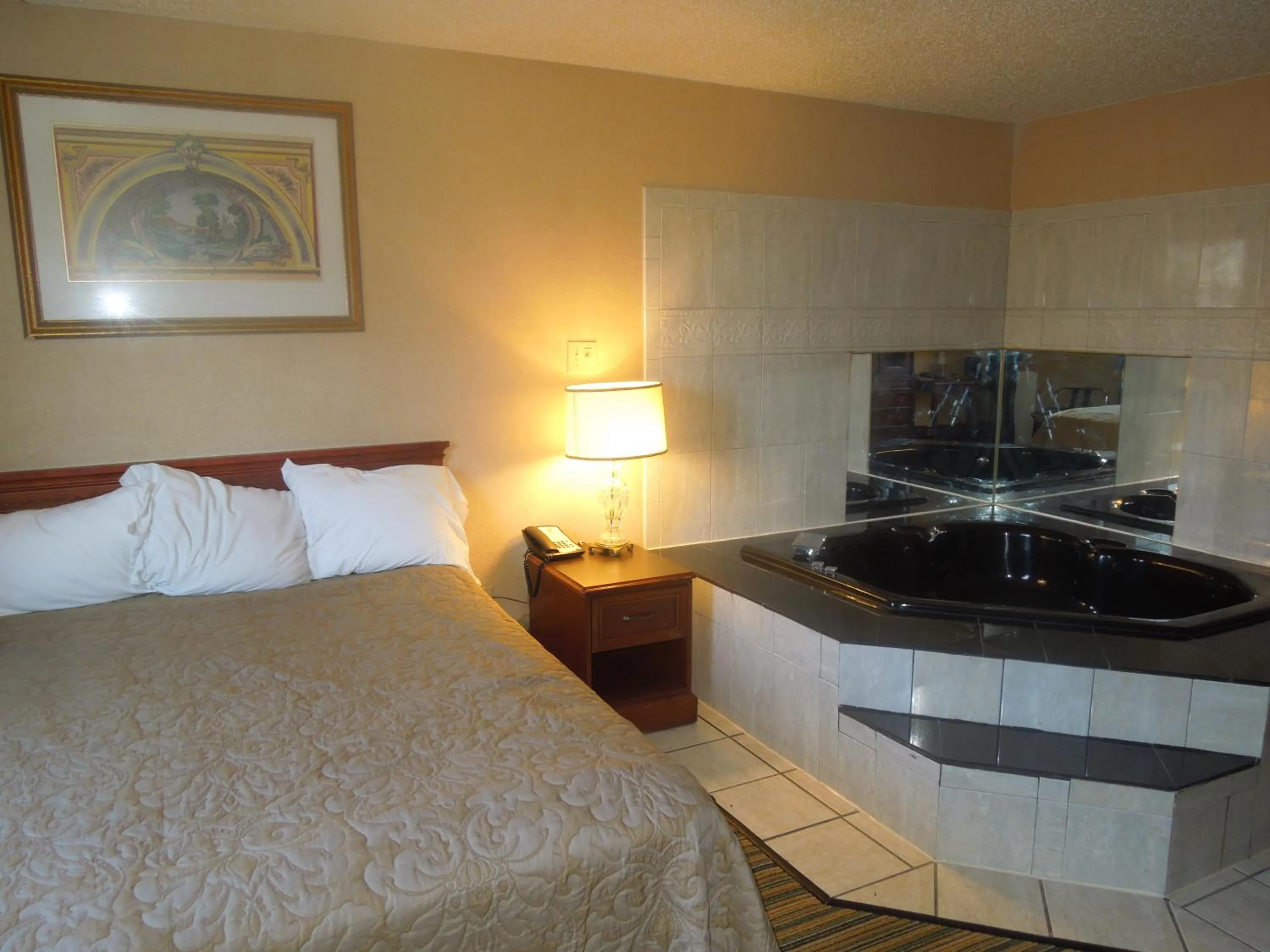 Bed in Super 8 by Wyndham Waldorf