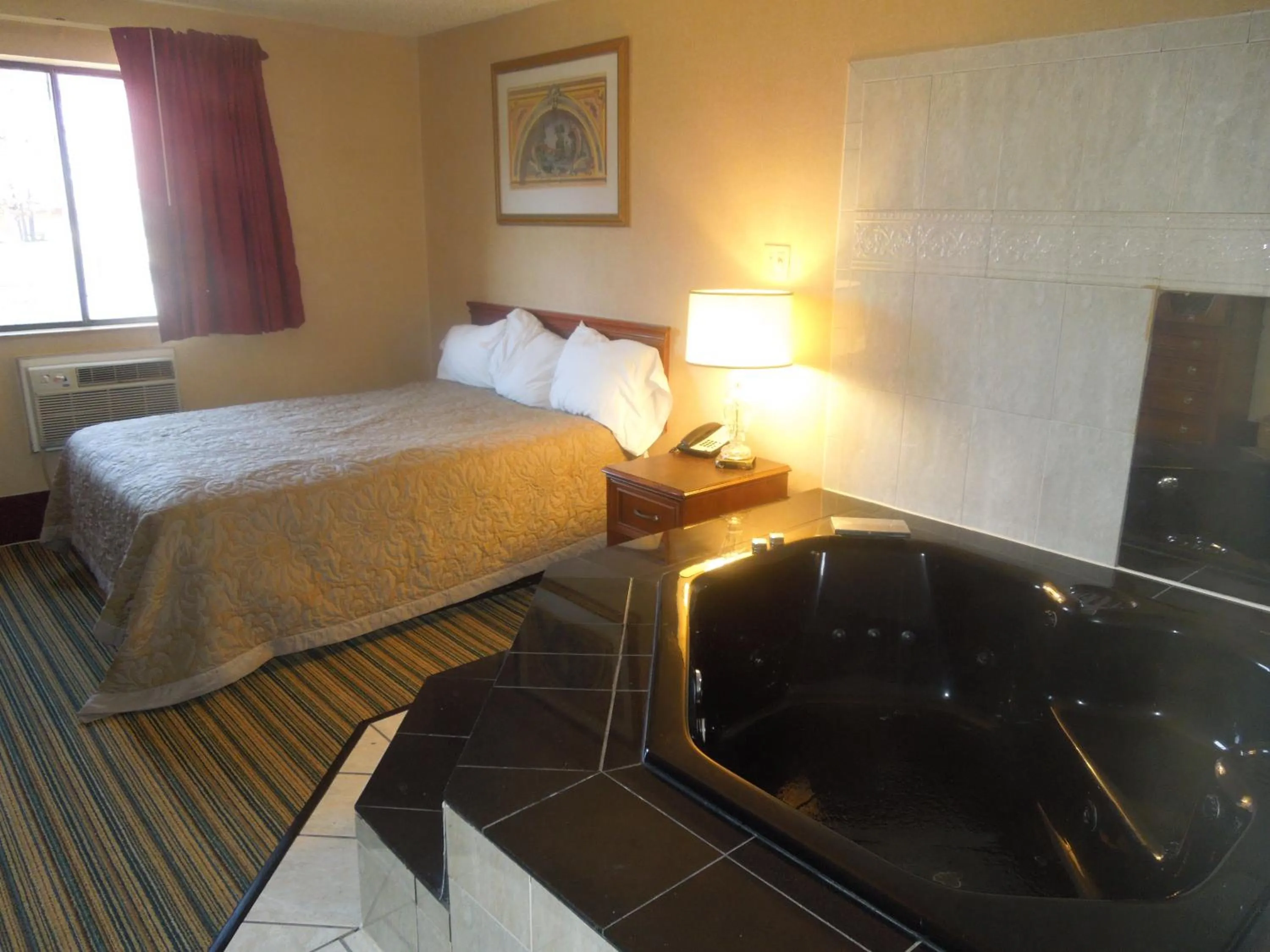 Bed in Super 8 by Wyndham Waldorf