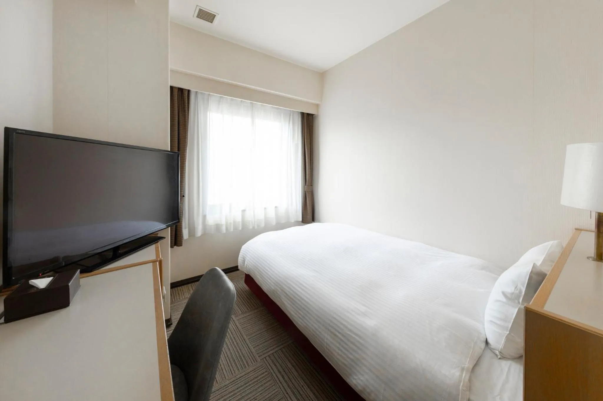 Bed in Court Hotel Niigata