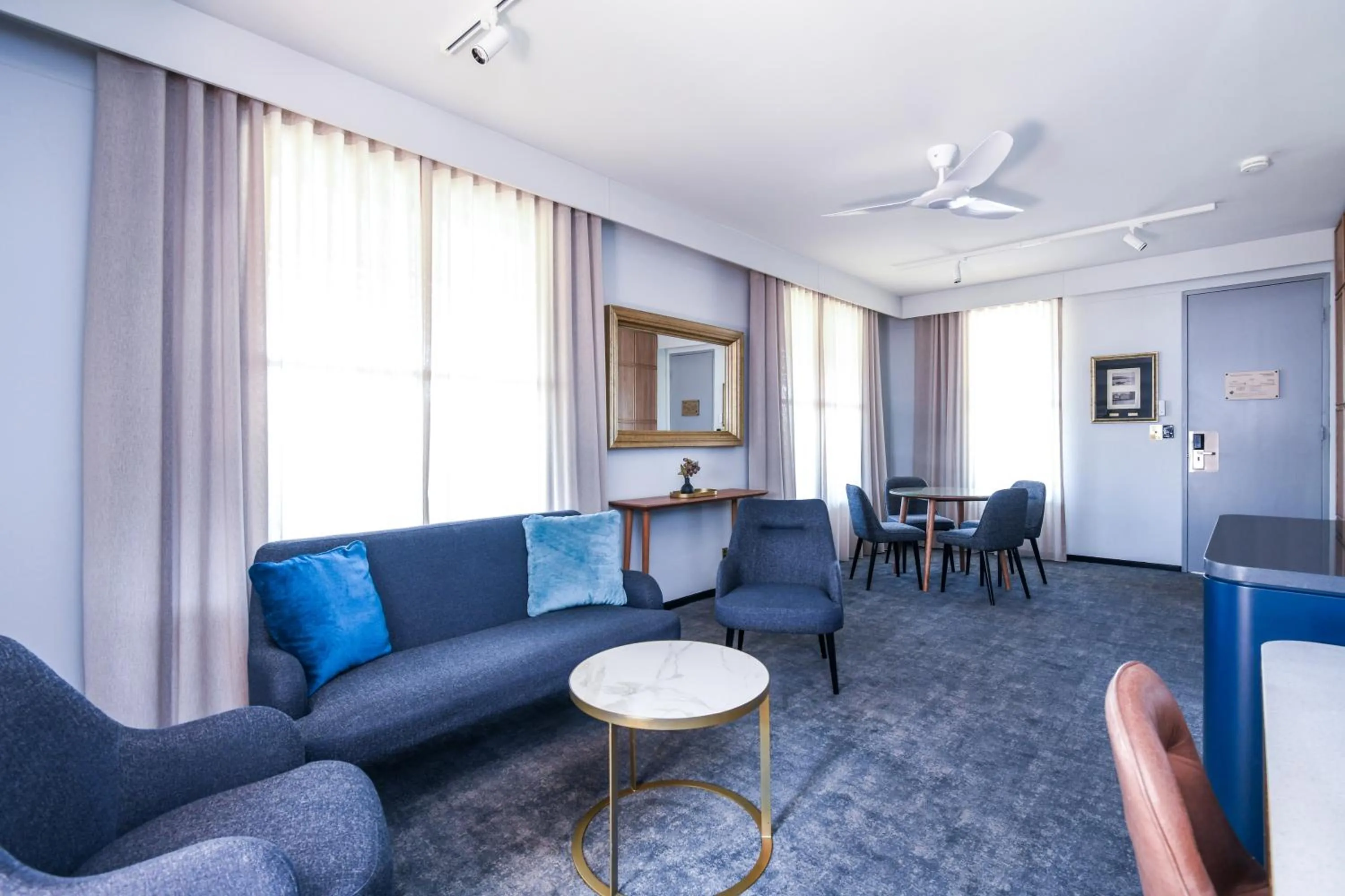 Living room in Powerhouse Hotel Tamworth by Rydges
