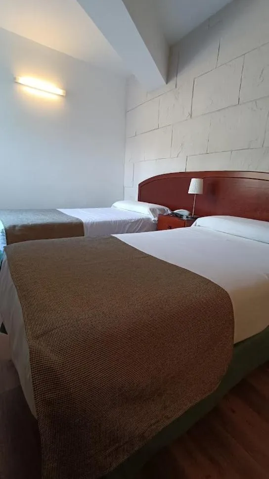 Bed in Hotel Boomerang