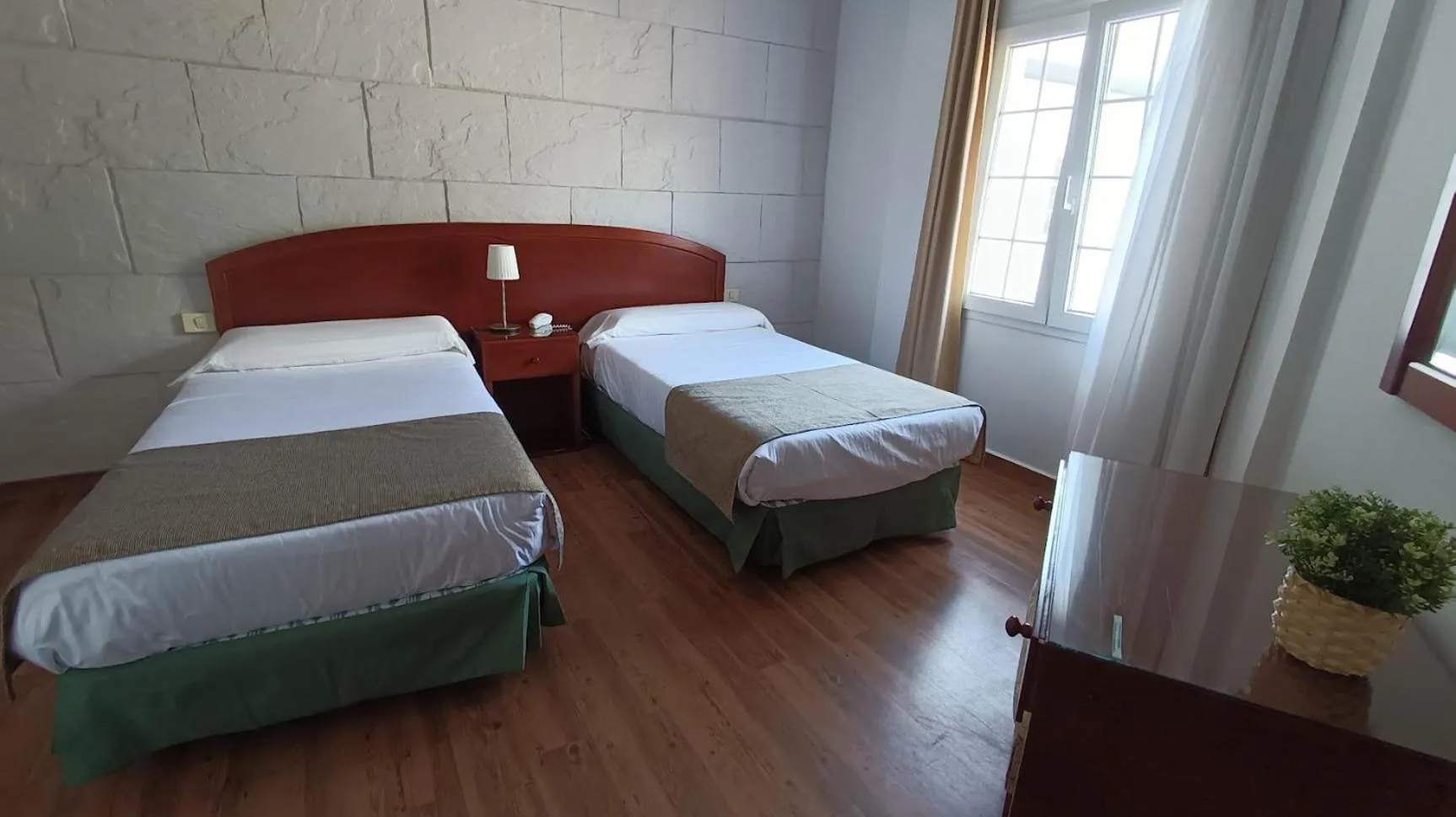 Bed in Hotel Boomerang