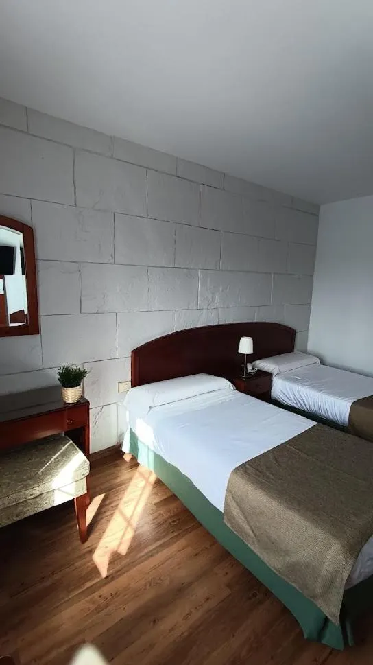 Bed in Hotel Boomerang