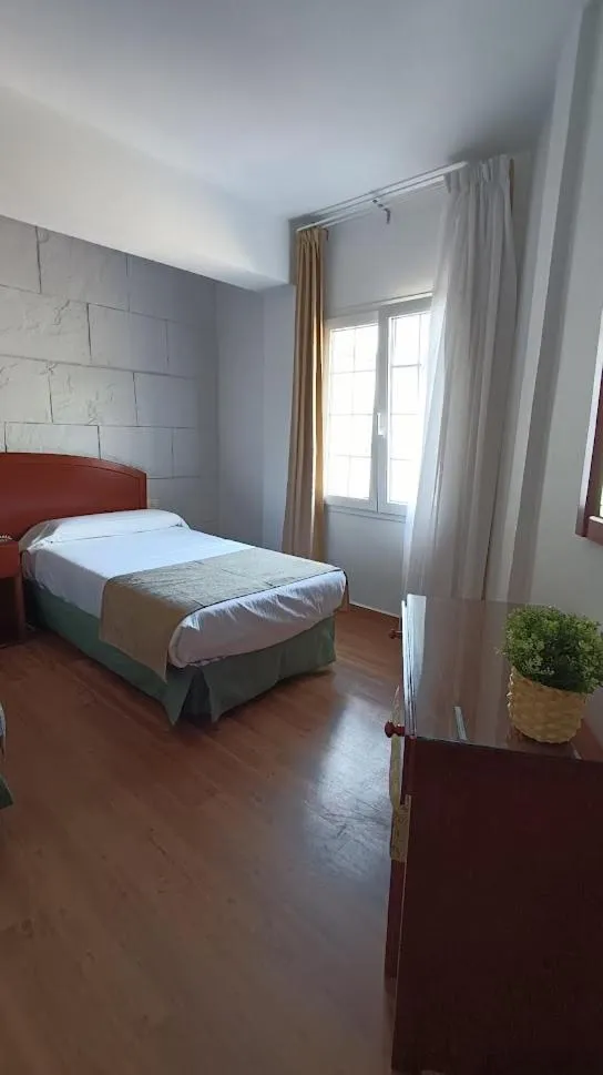 Bed in Hotel Boomerang