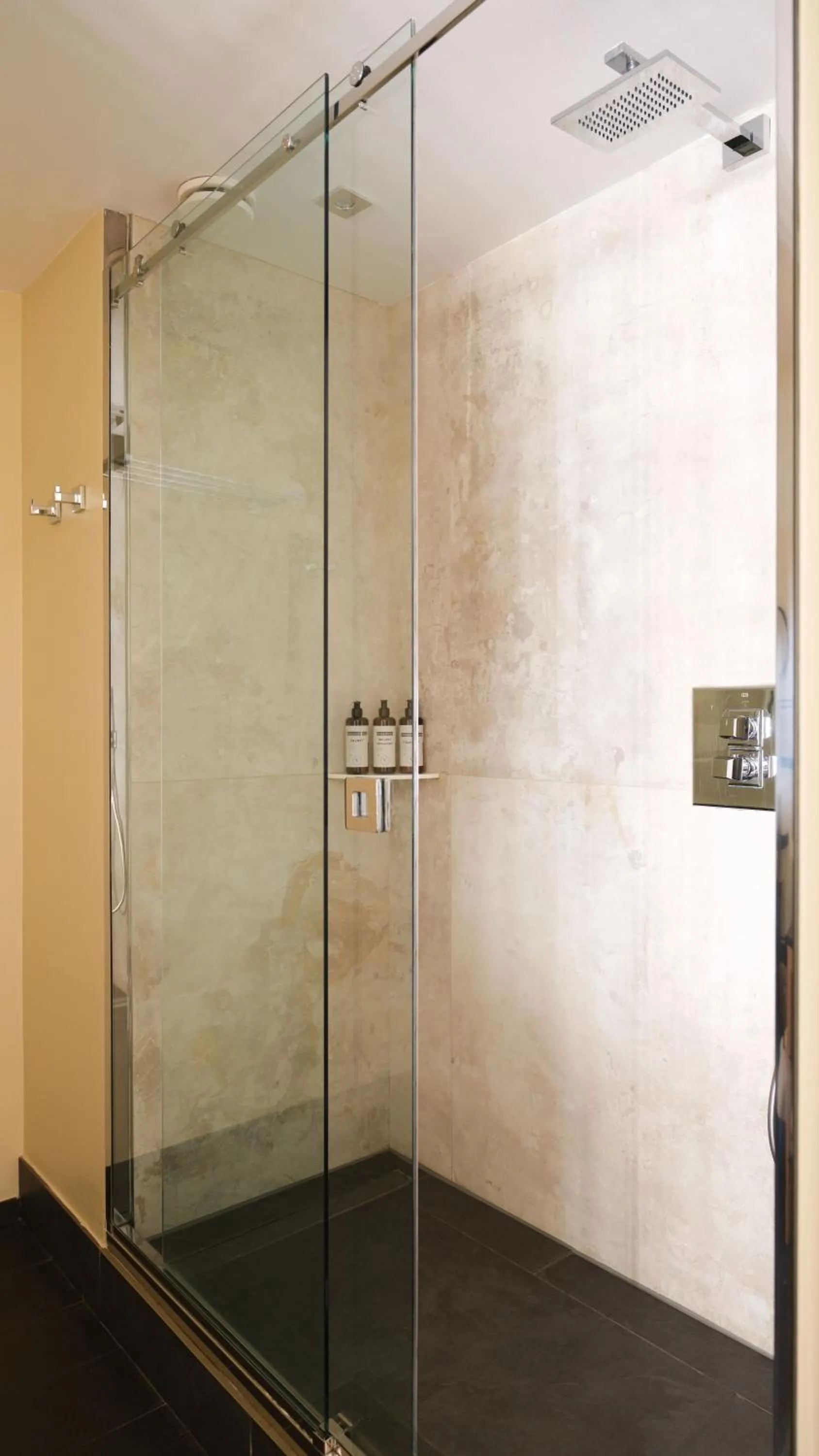 Shower in Five Seas by Inwood Hotels