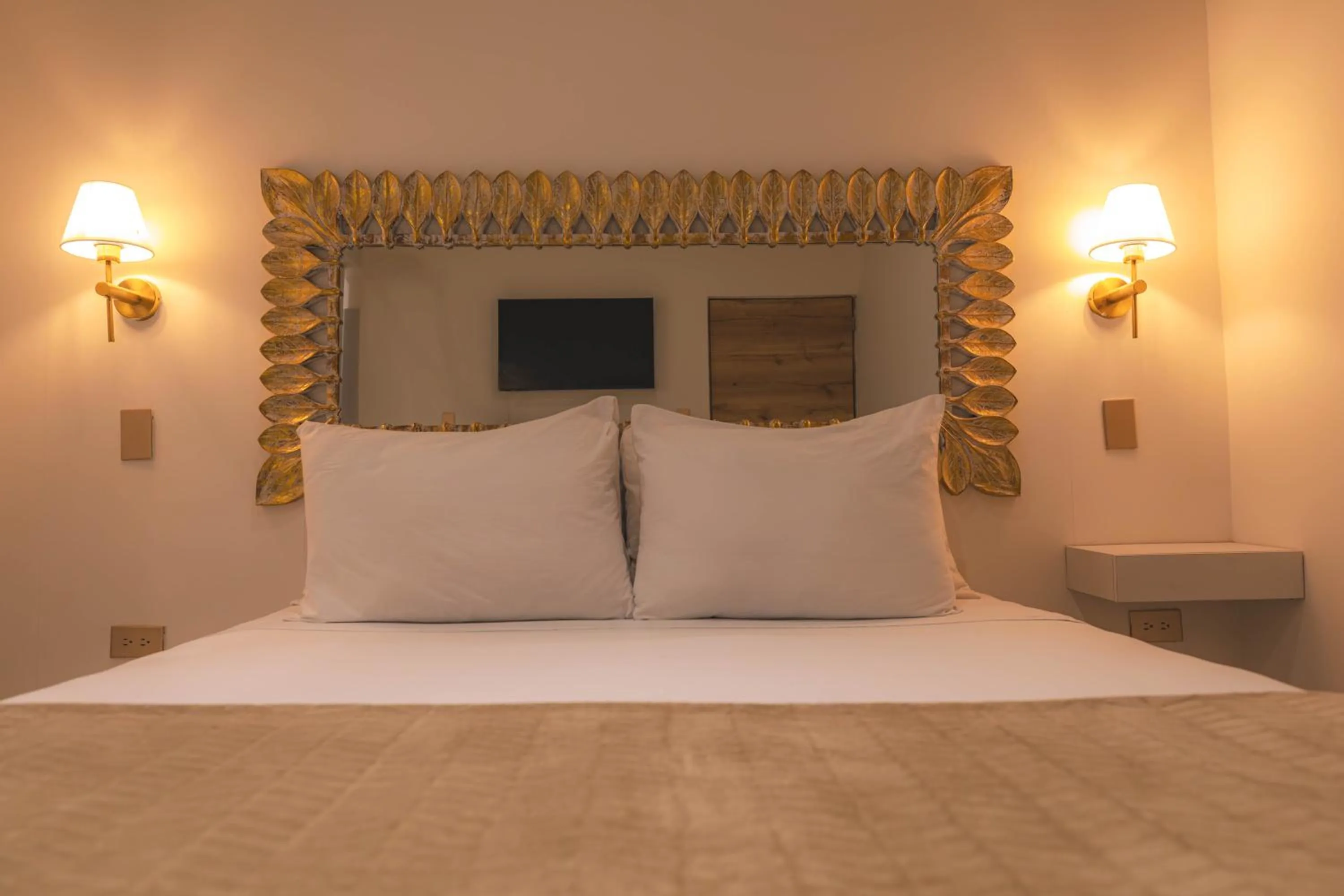 Bed in Ataraxy Hotel Boutique