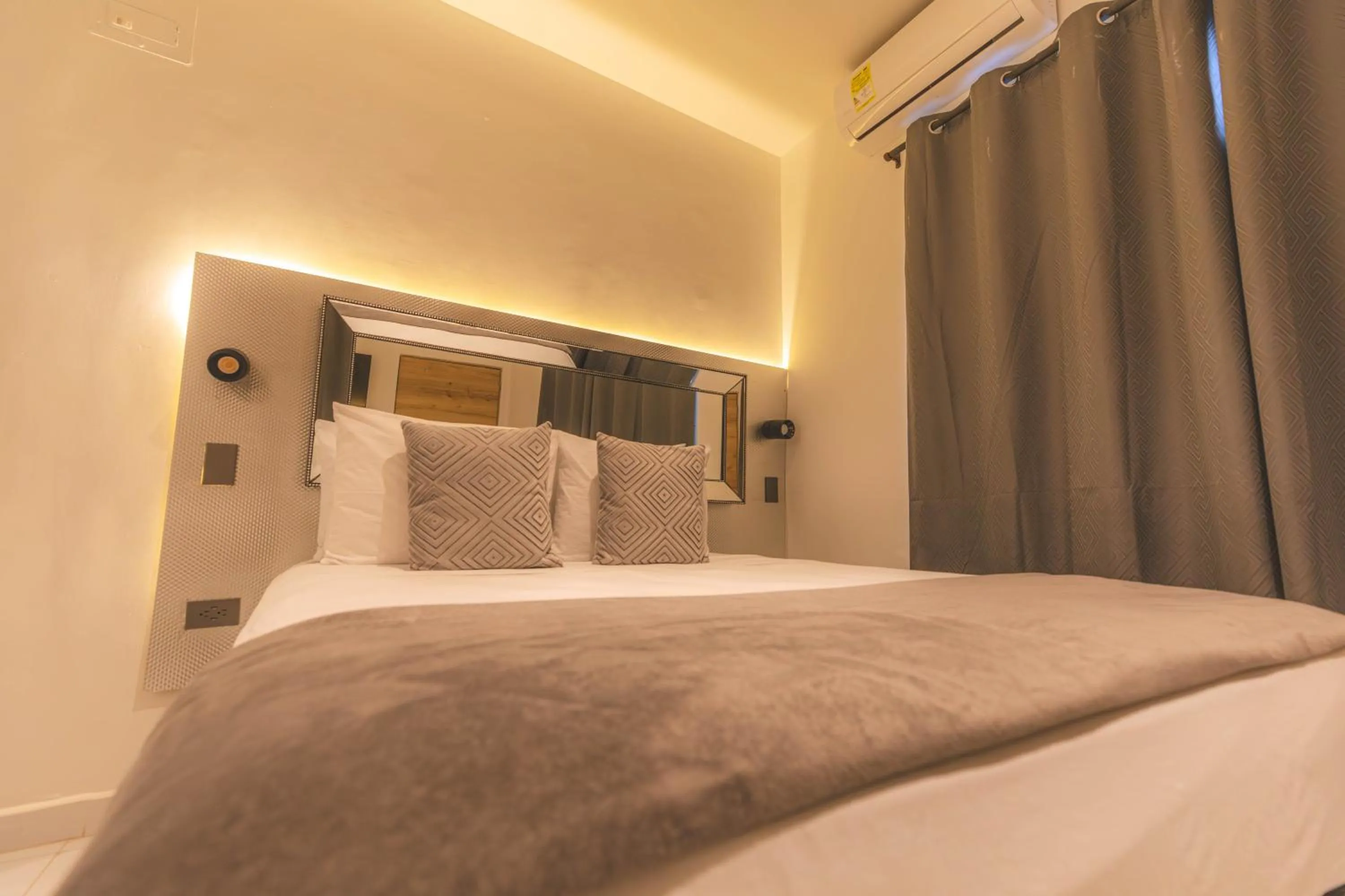 Bed in Ataraxy Hotel Boutique