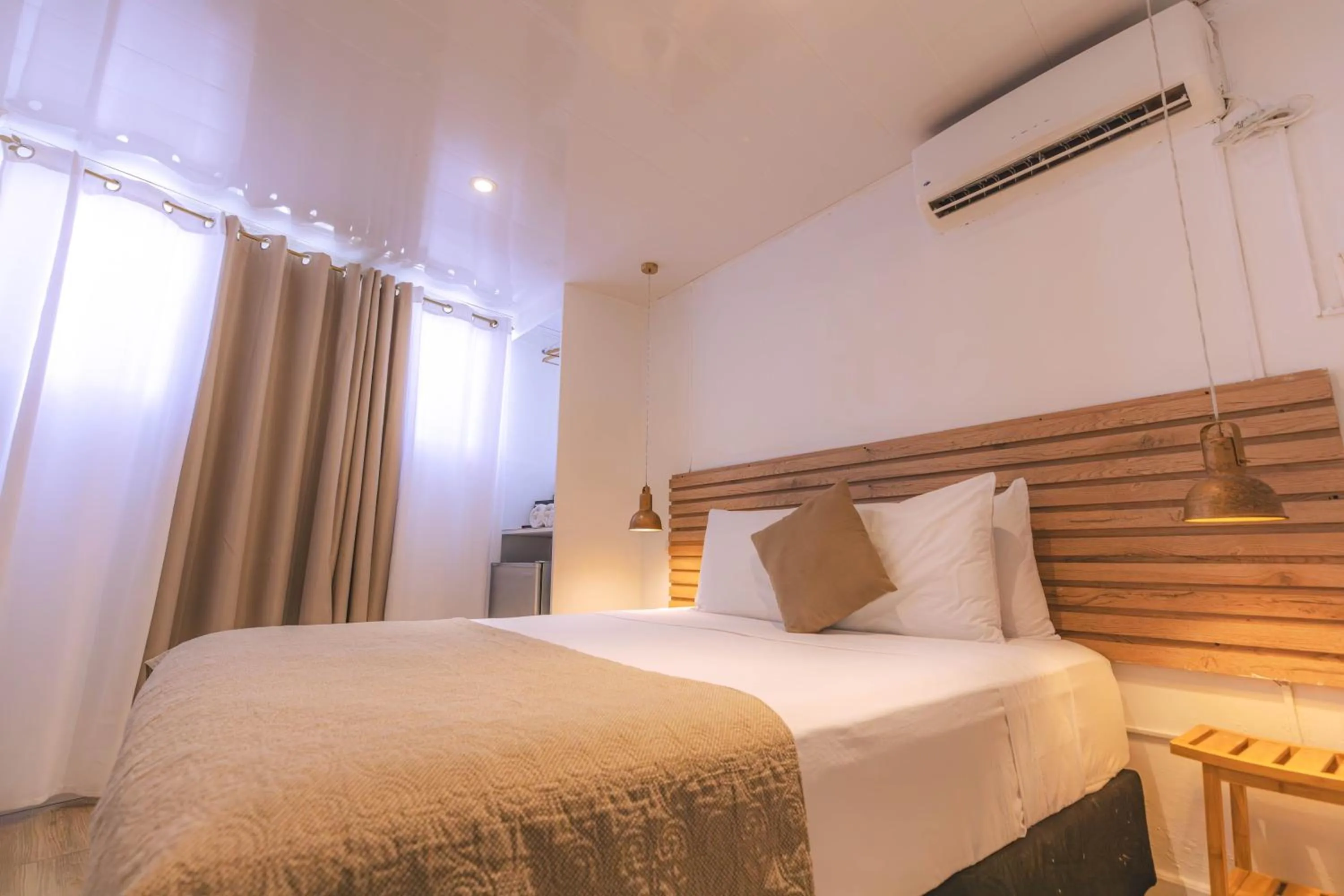 Bed in Ataraxy Hotel Boutique