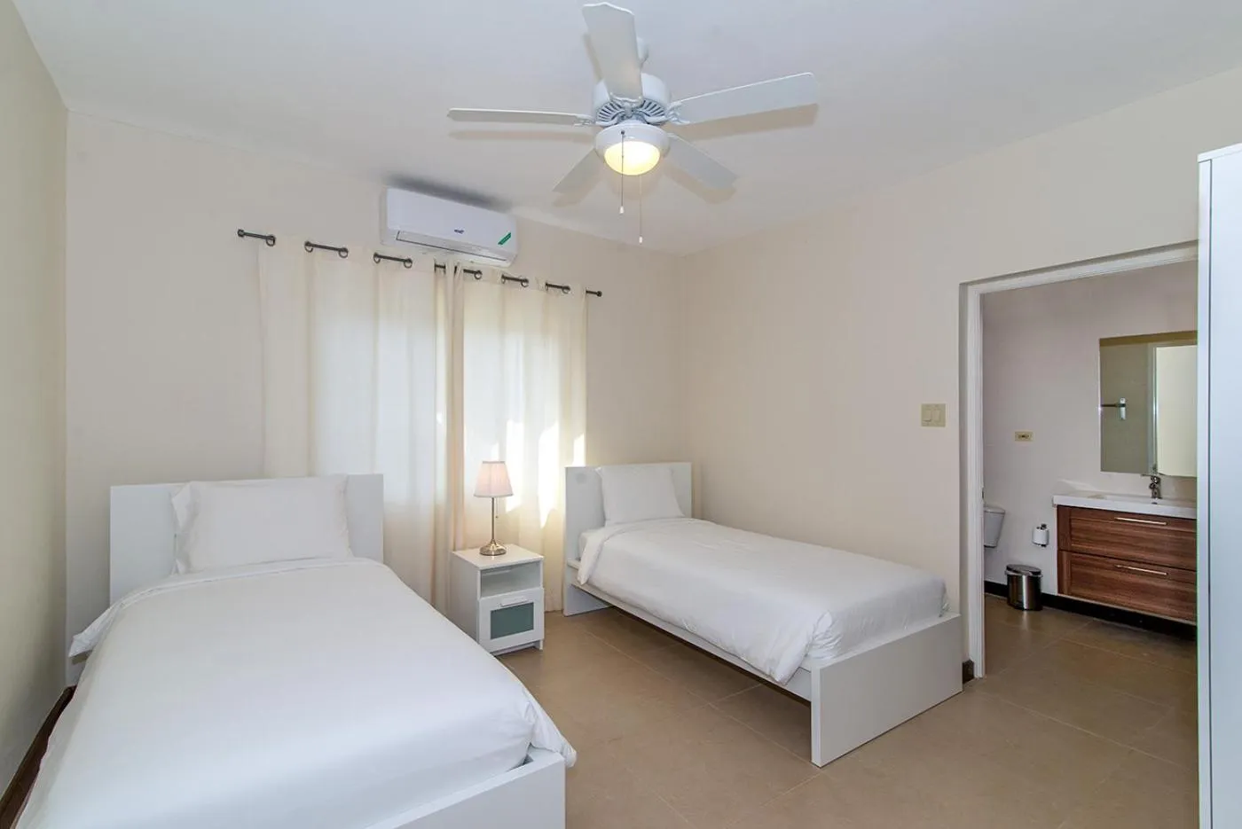 Bedroom, Bed in Family Complex beside Beach w/Pool Montego Bay #2