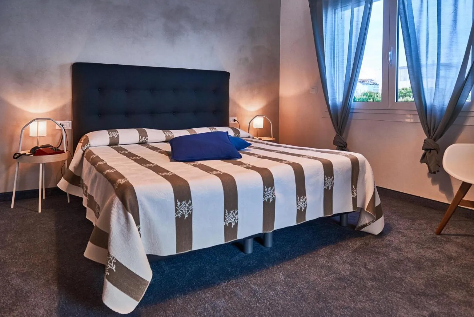 Bed in Hotel Concordia