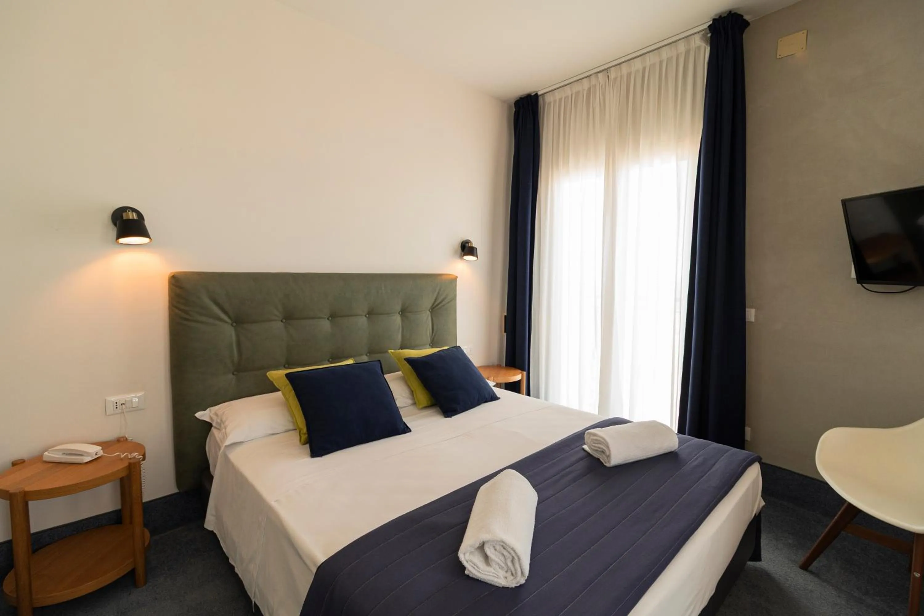 Bed in Hotel Concordia