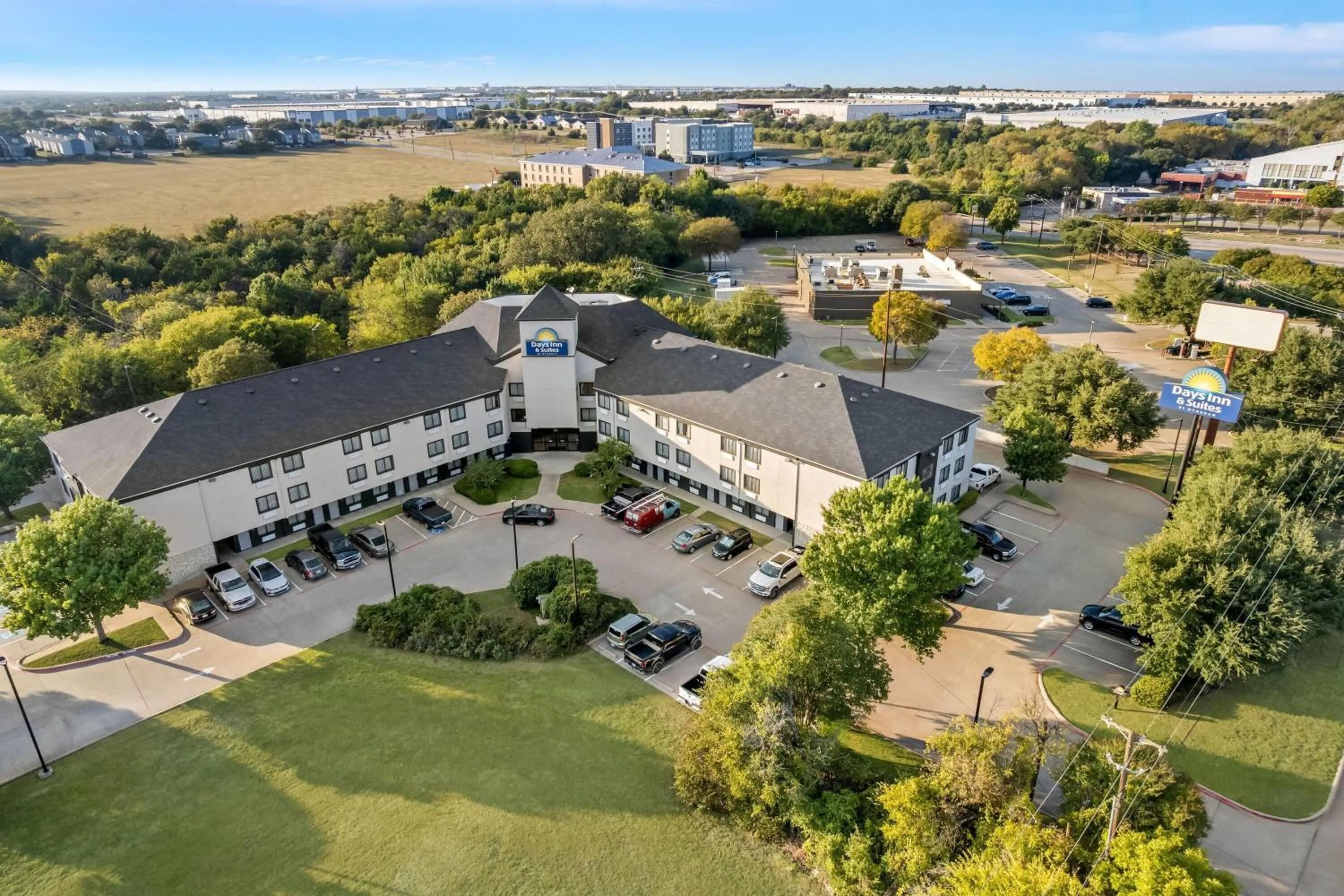 Property building in Days Inn & Suites by Wyndham DeSoto