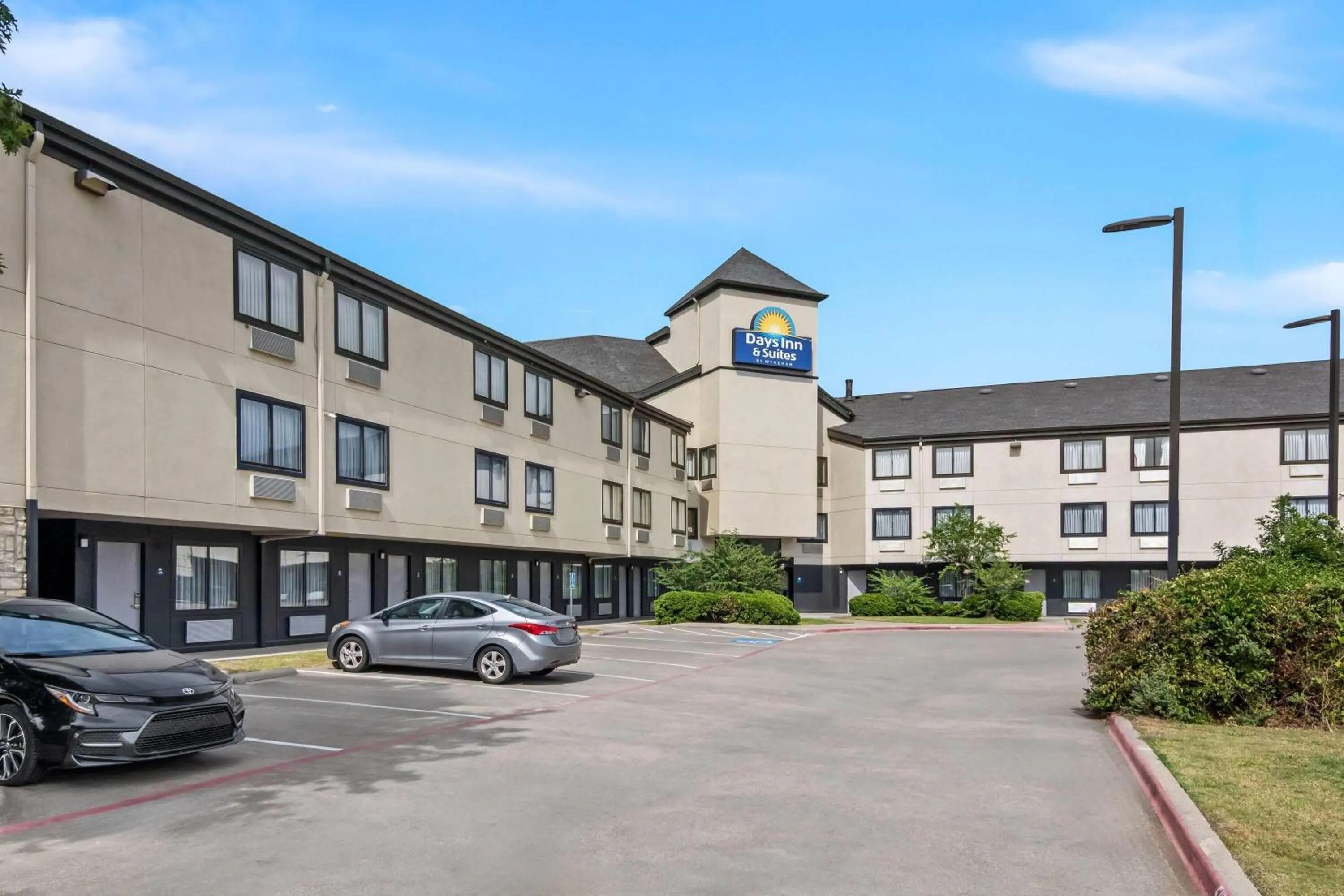 Swimming pool in Days Inn & Suites by Wyndham DeSoto