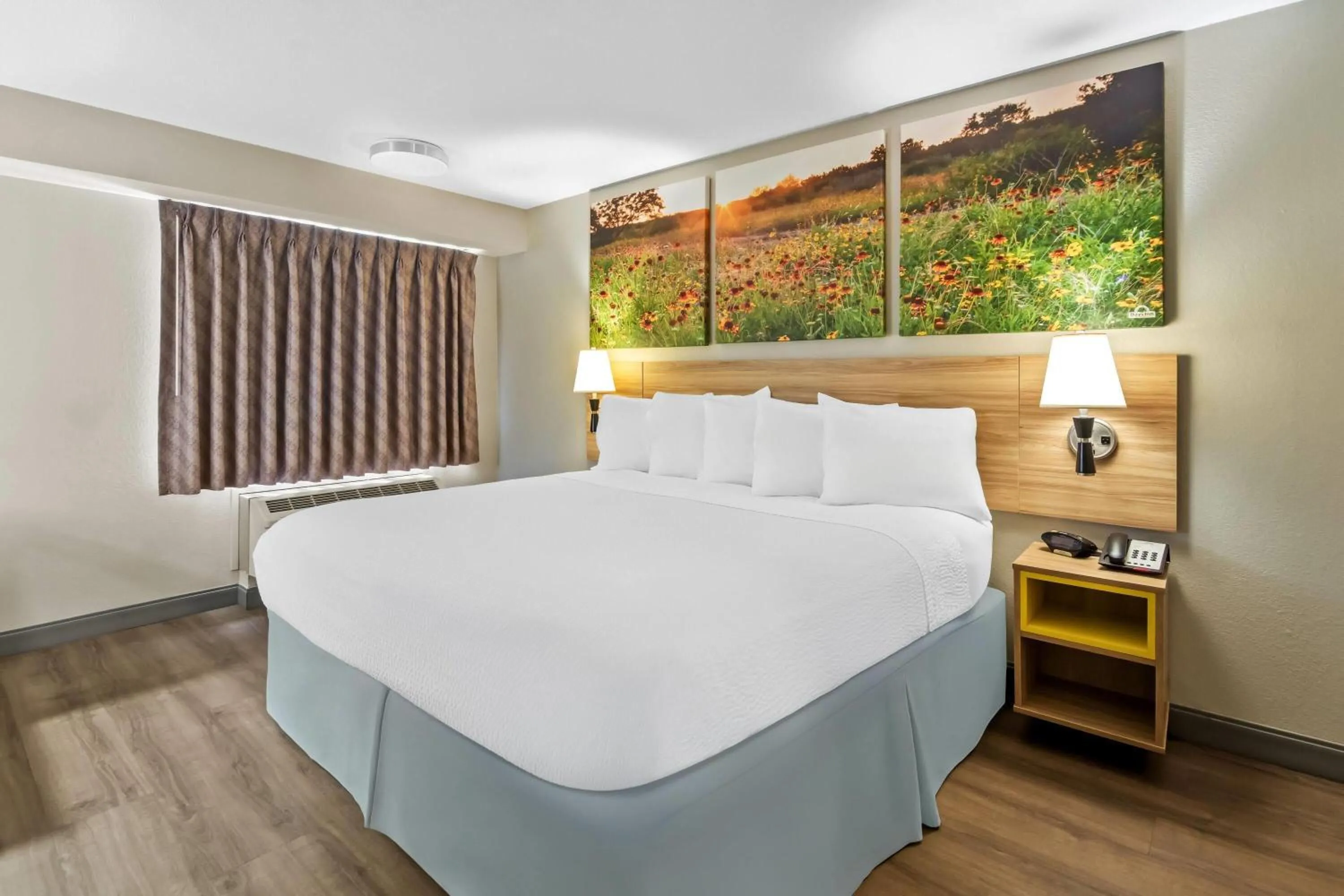 Bed in Days Inn & Suites by Wyndham DeSoto