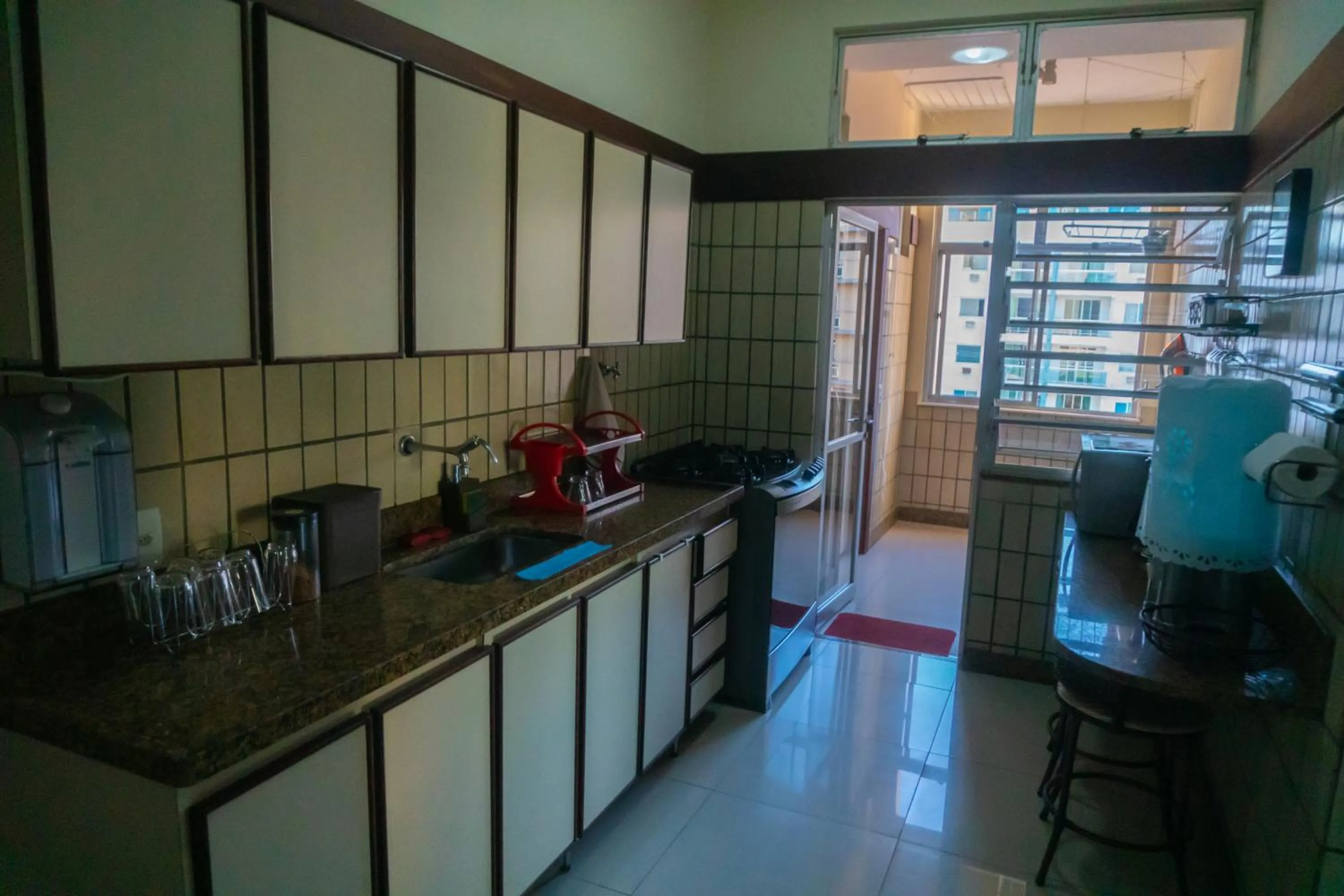 kitchen in Maravilhoso Apto na Praia do Forte Wi-Fi 600 MB