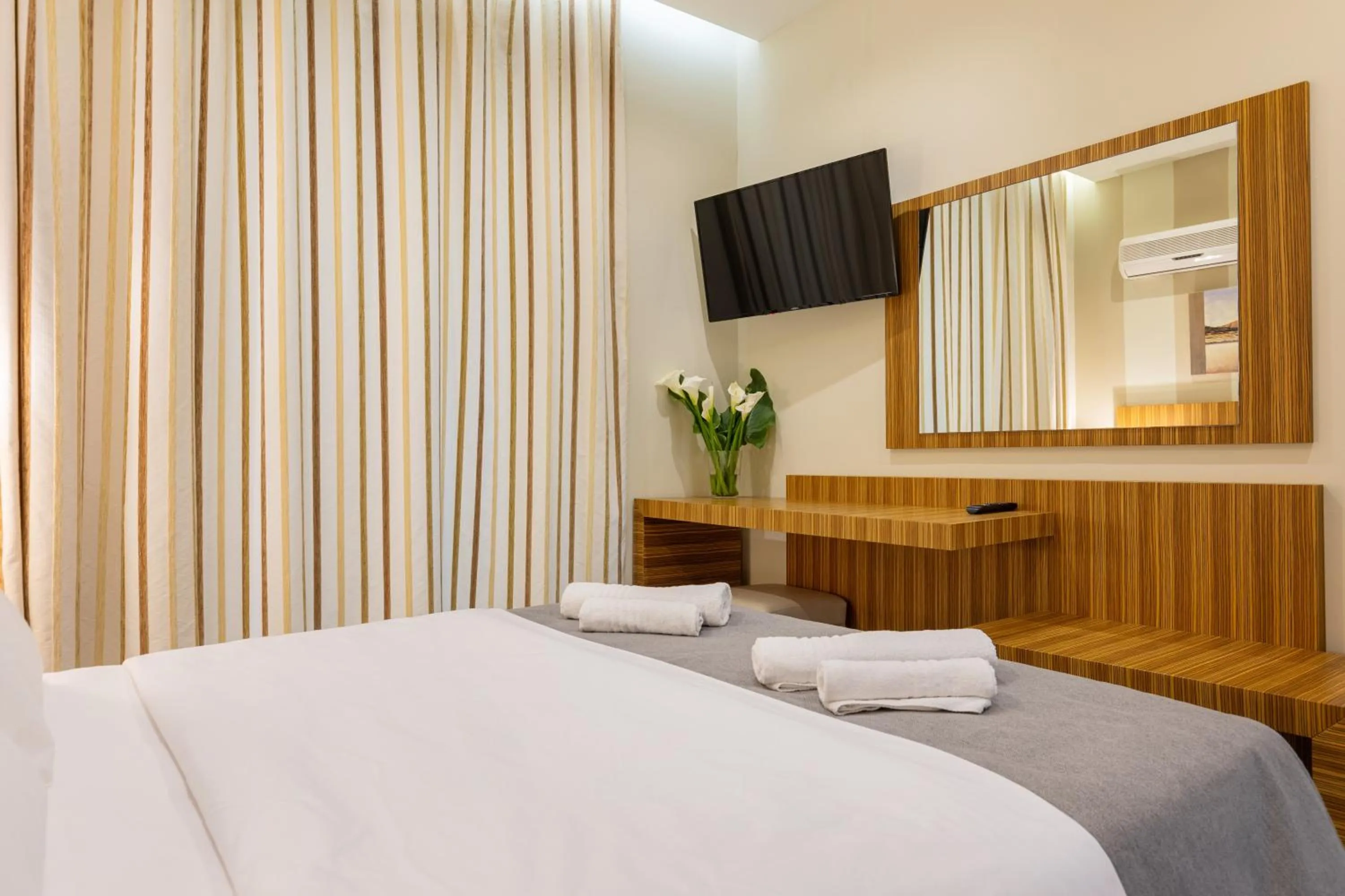 Bed in Agrilia Hotel Adults Only