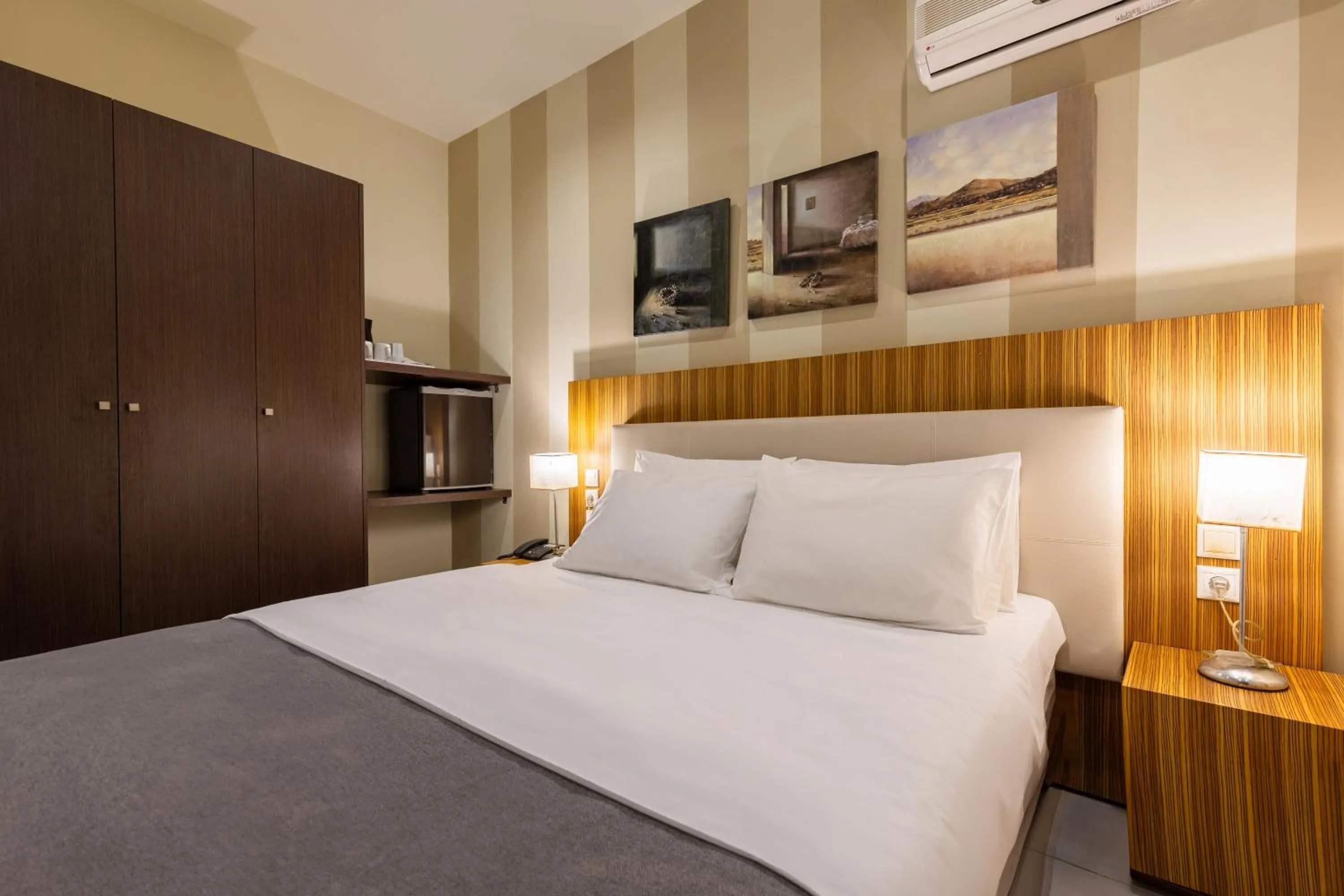 Bed in Agrilia Hotel Adults Only