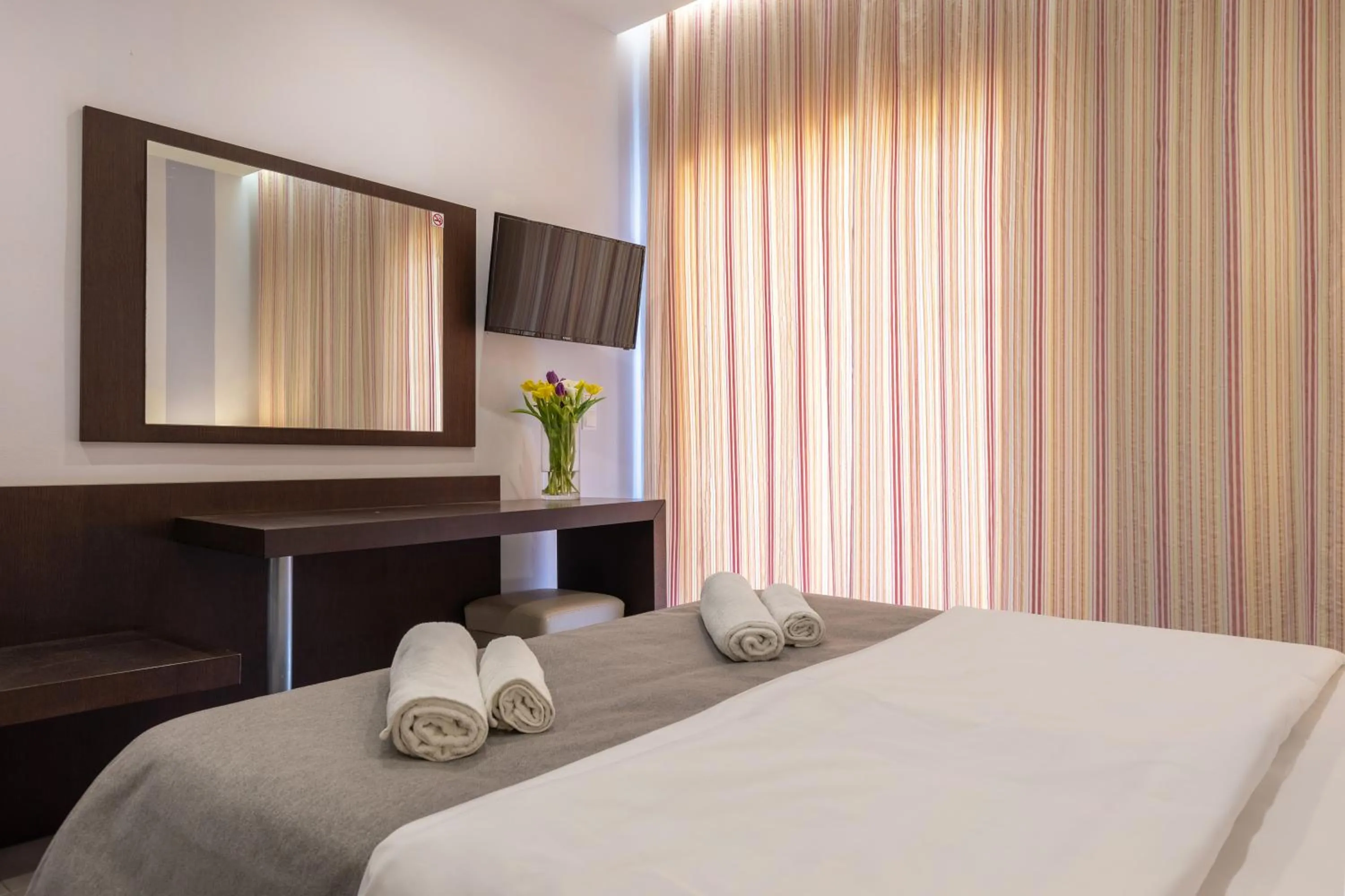 Bed in Agrilia Hotel Adults Only