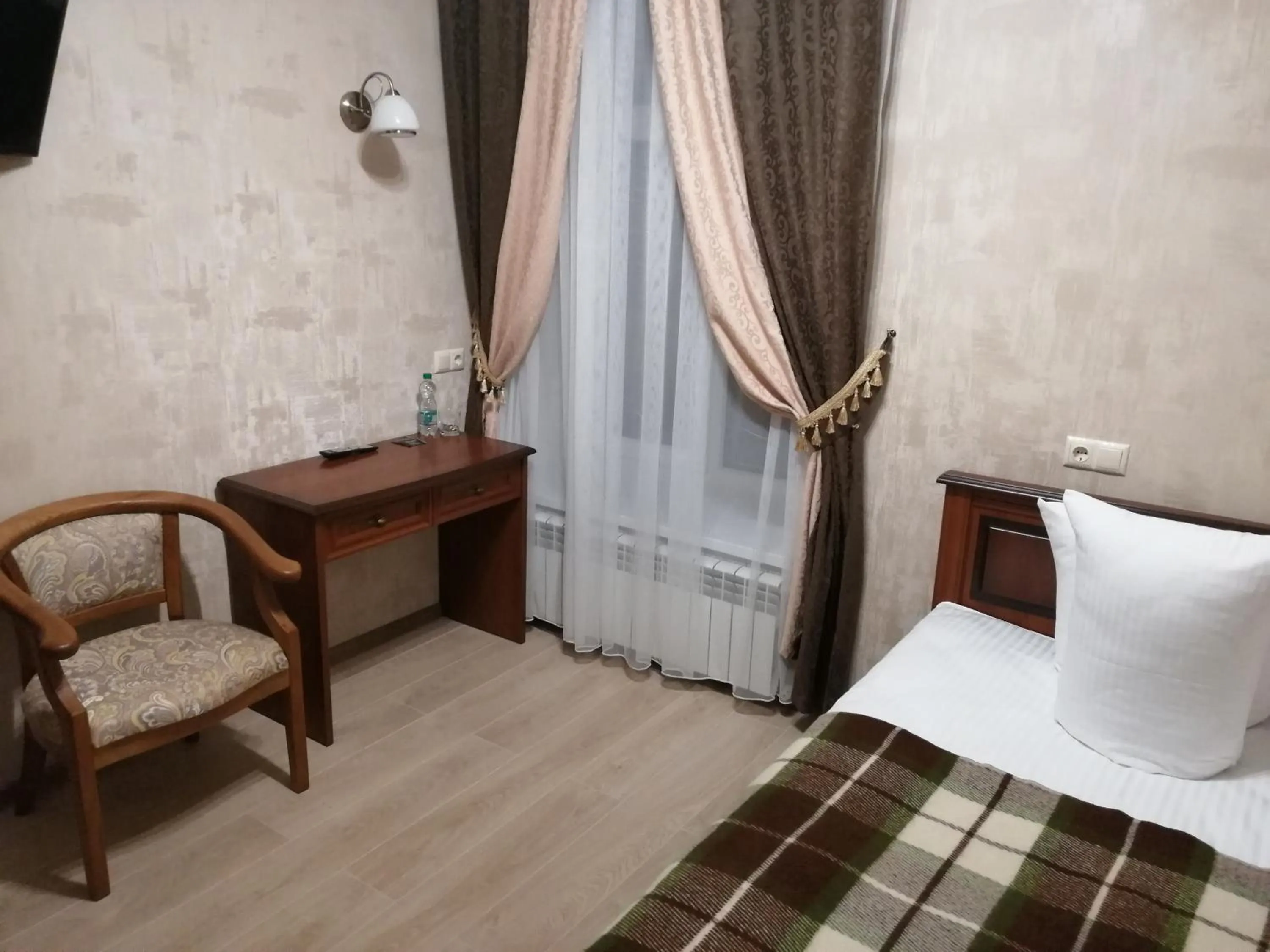 Photo of the whole room, Bed in Centralnyi hotel