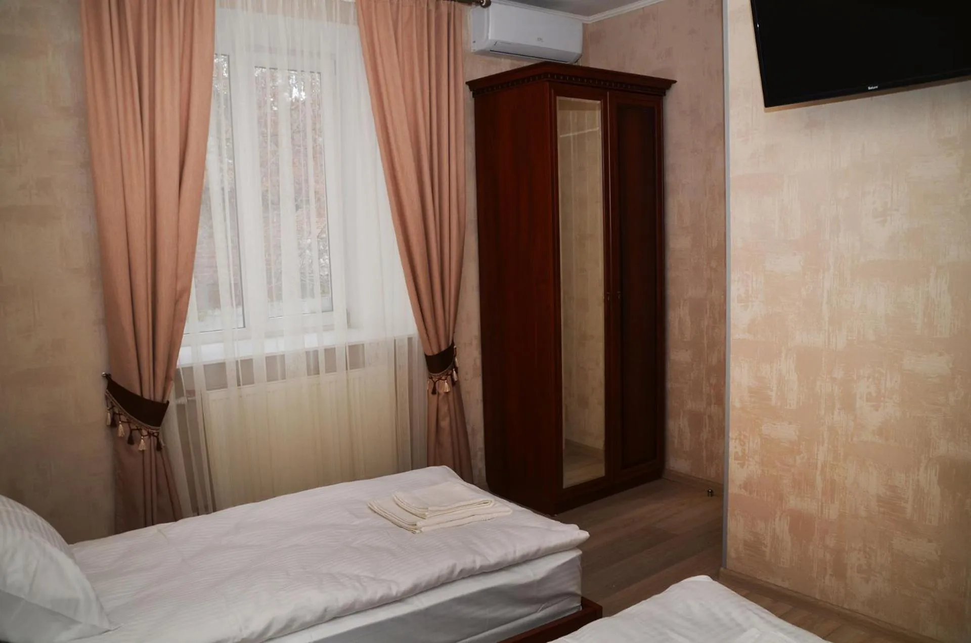 wardrobe, Bed in Centralnyi hotel