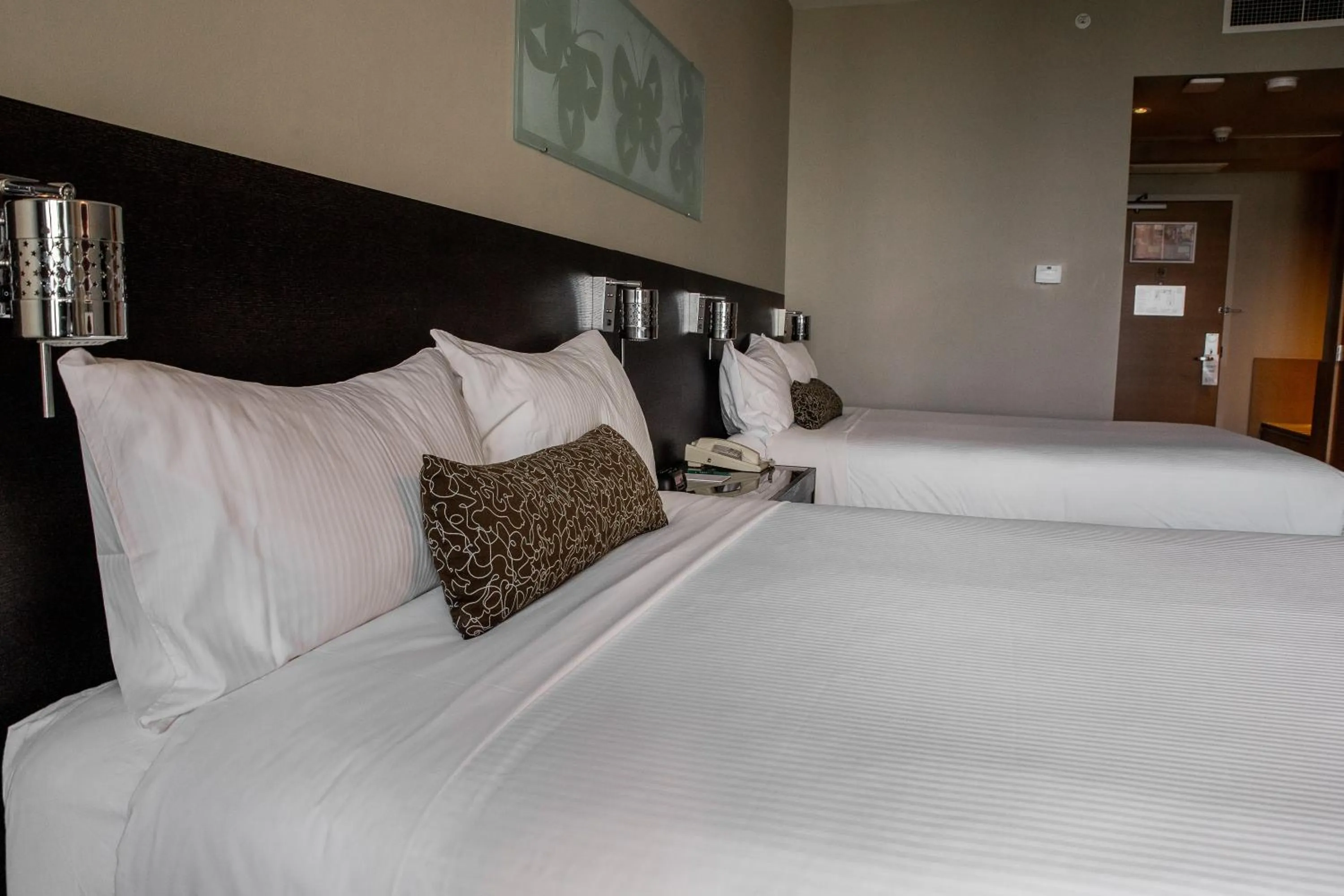 Bed in The Sidney Pier Hotel & Spa