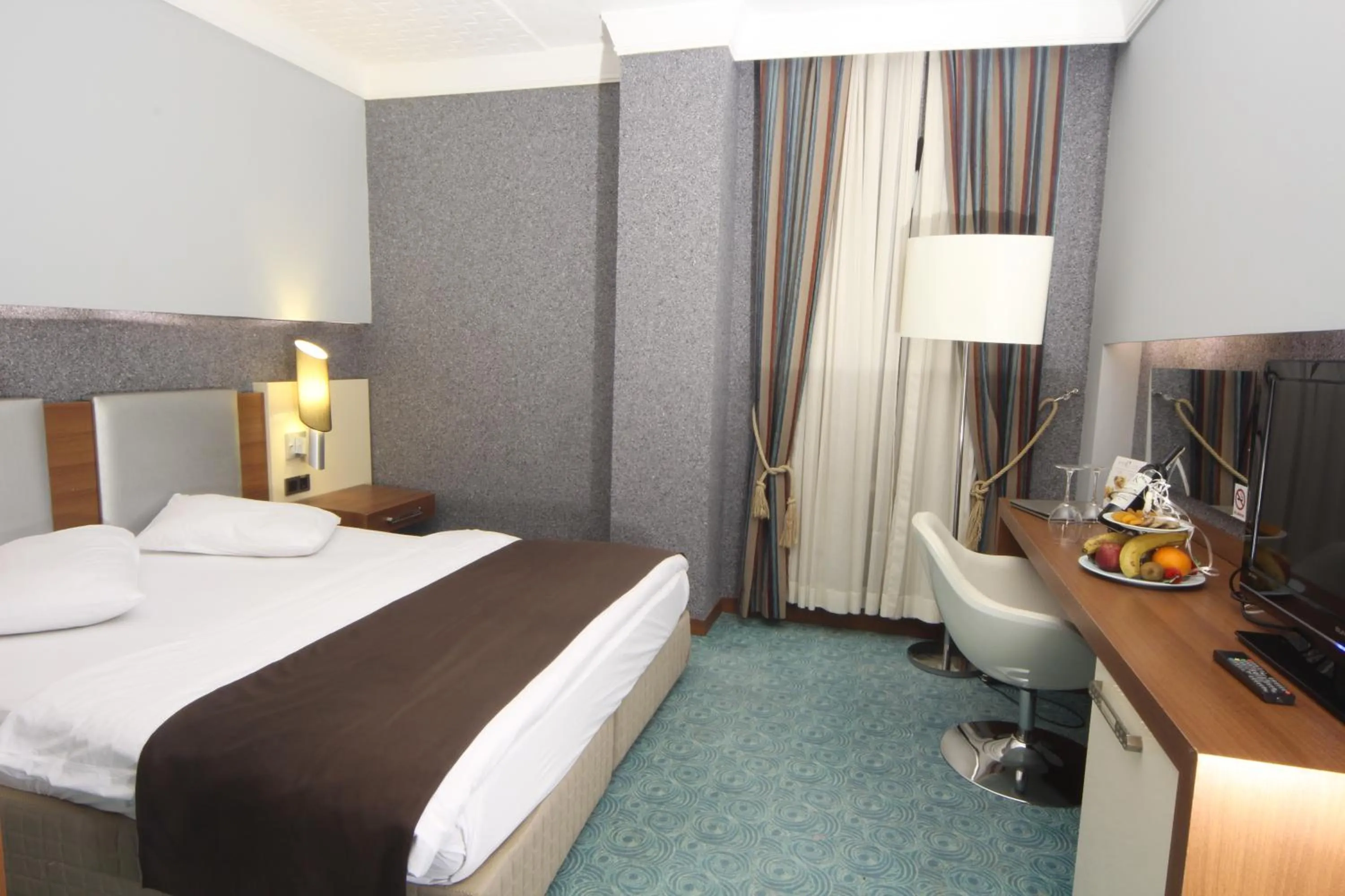 Photo of the whole room, Bed in Suhan Cappadocia Hotel & Spa