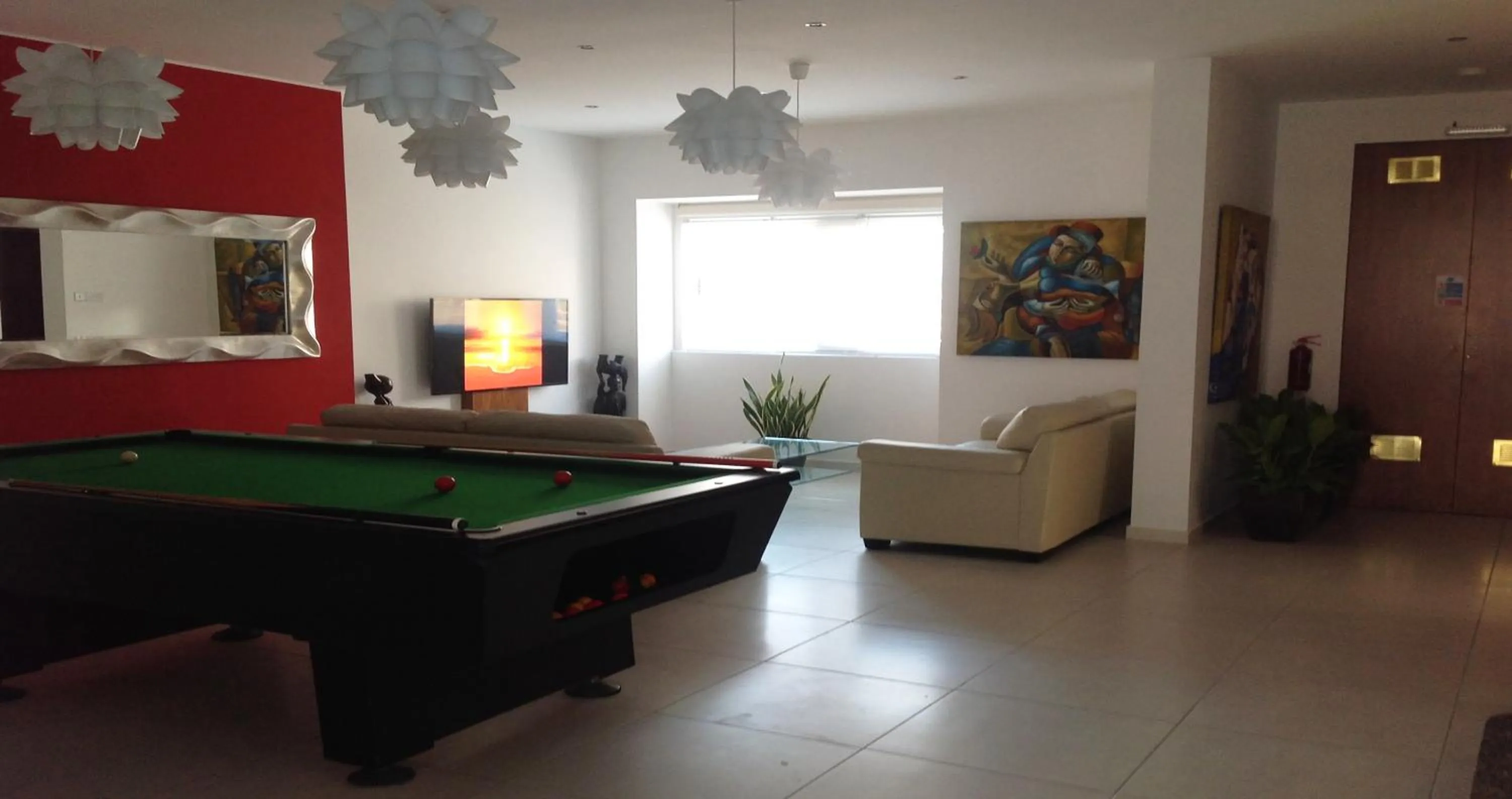 Communal lounge/ TV room in 8villa