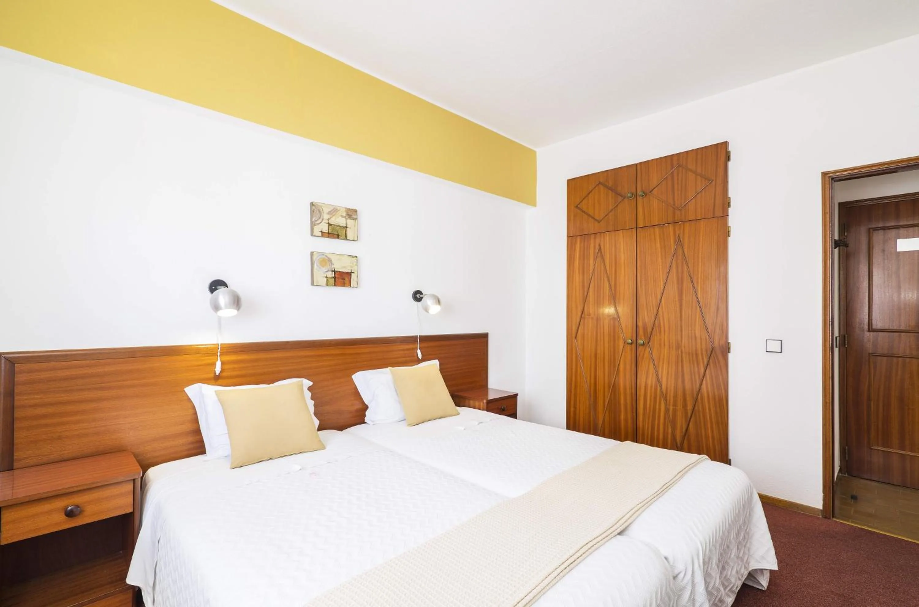 Bed in Rosamar Apartamentos