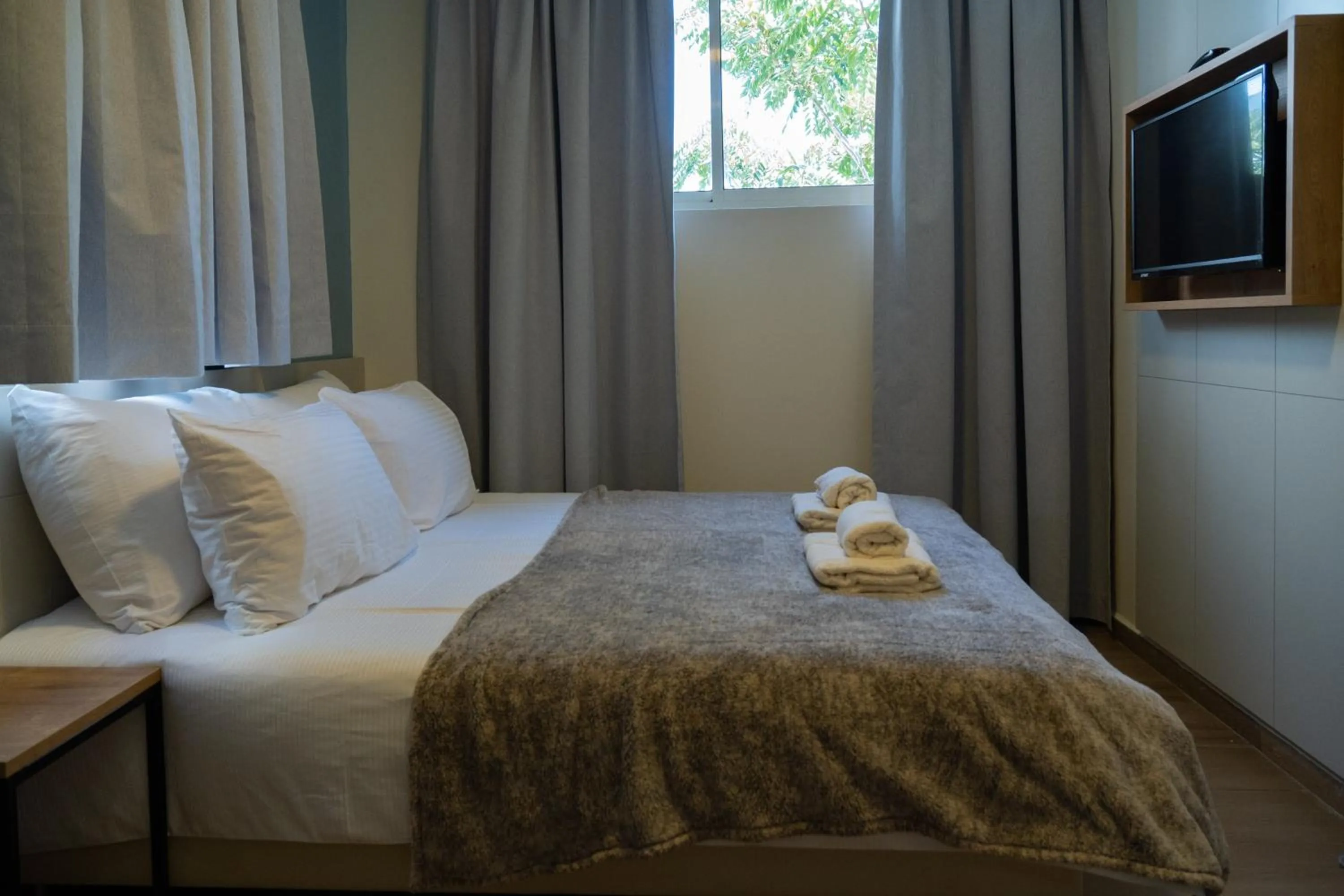 Bed in Shlomtzi Hotel
