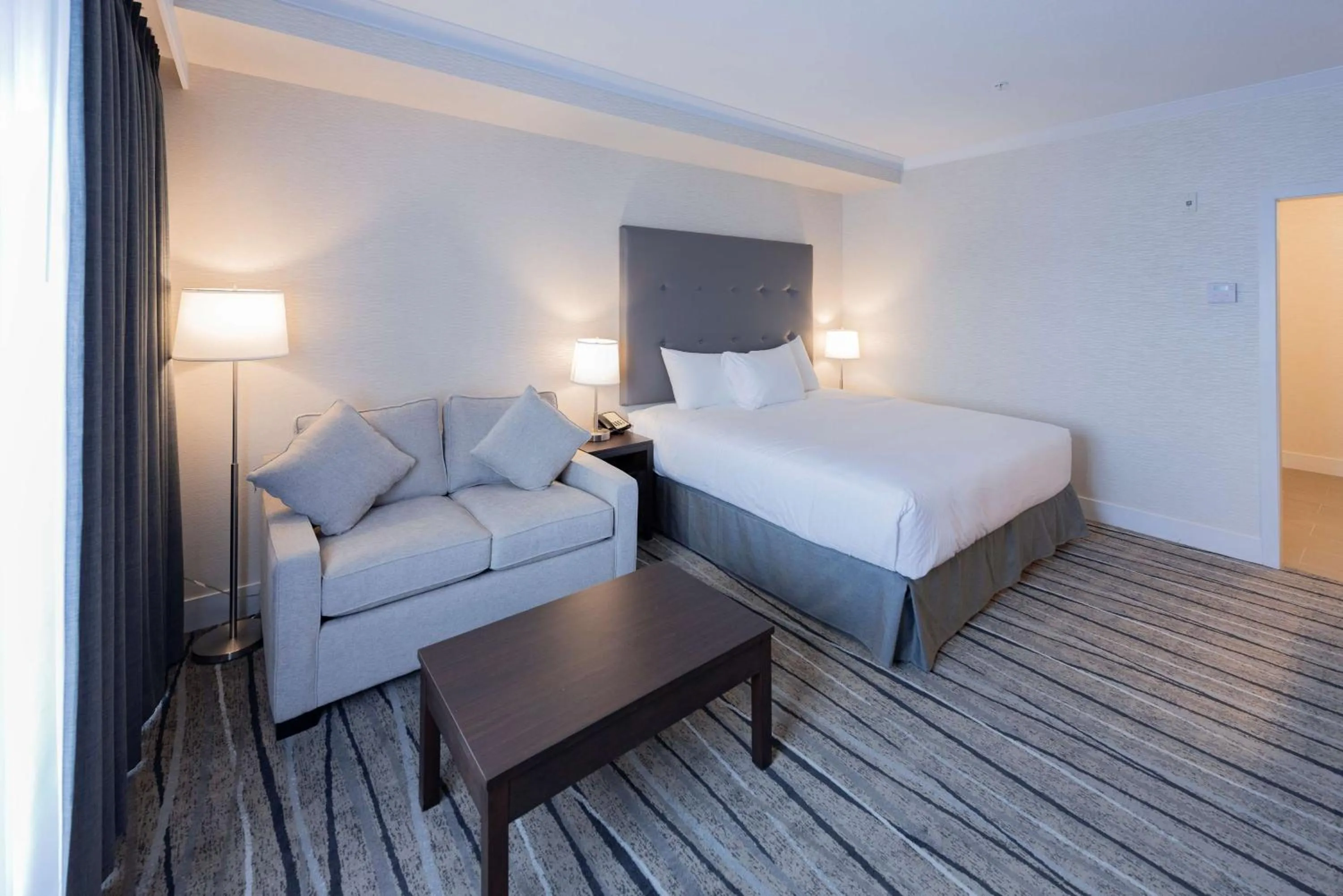 Bathroom, Bed in Prestige Treasure Cove Resort