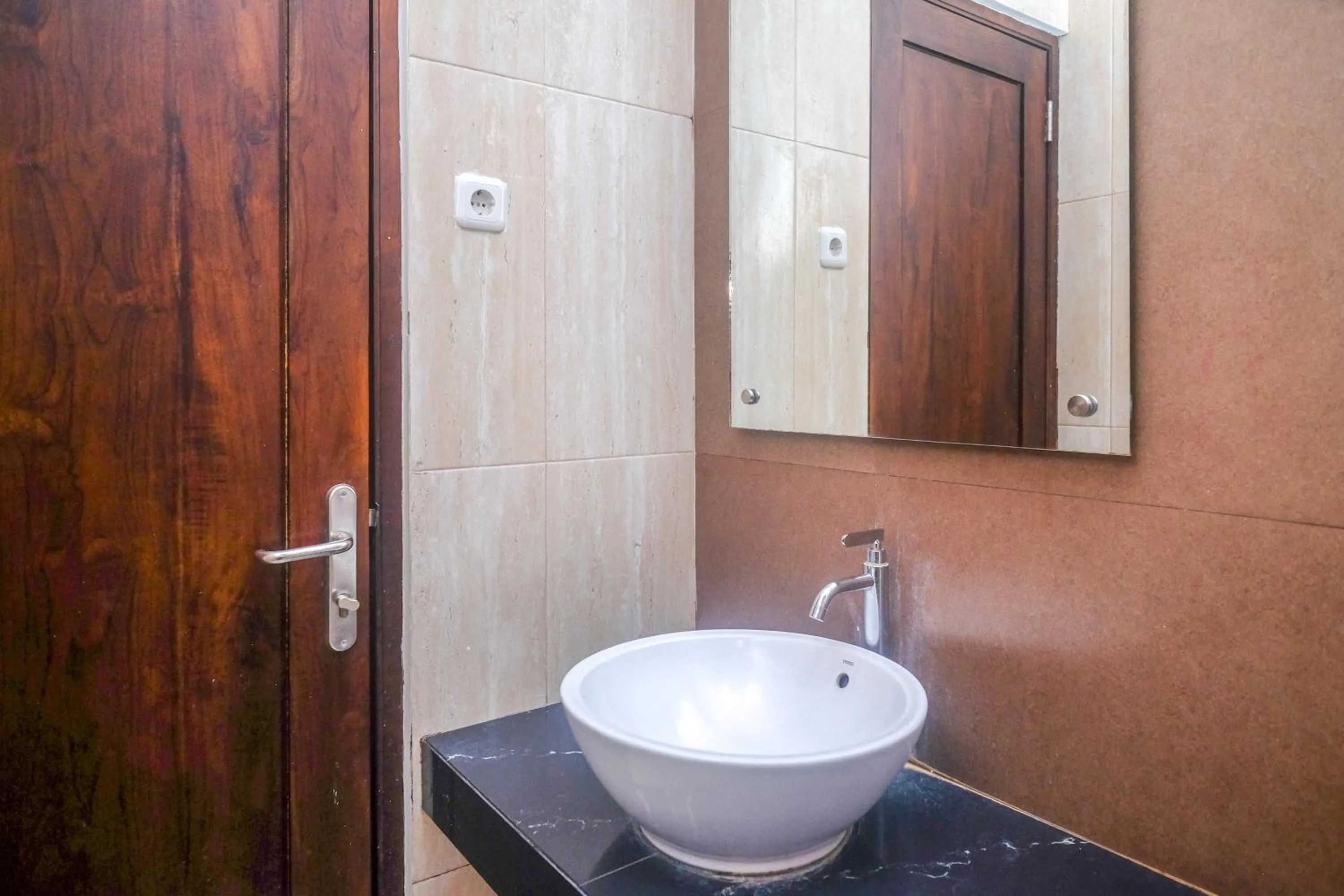 Bathroom in Sans Hotel Nagari Malioboro