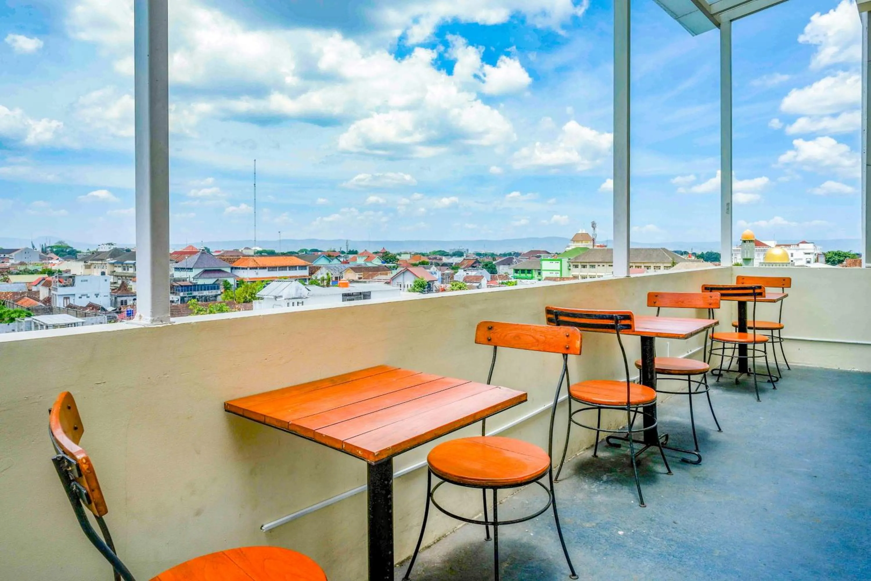 Seating area in Sans Hotel Nagari Malioboro