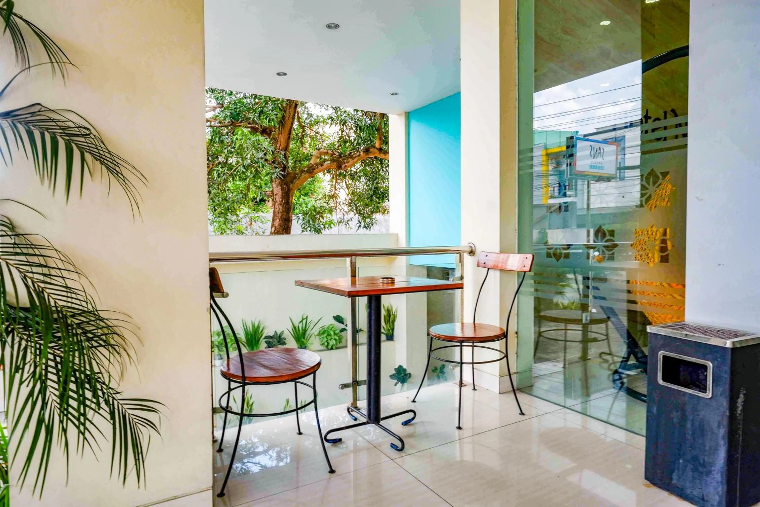 Seating area in Sans Hotel Nagari Malioboro