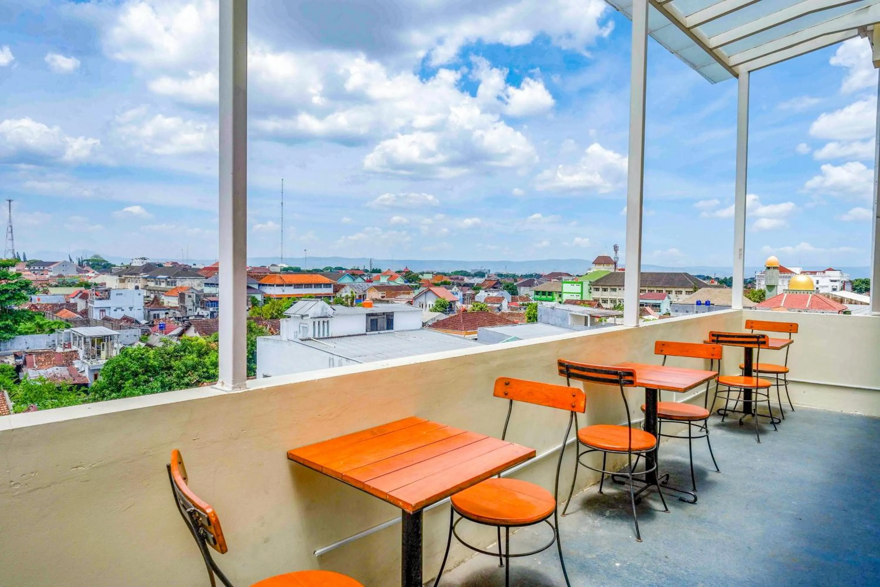 Seating area in Sans Hotel Nagari Malioboro
