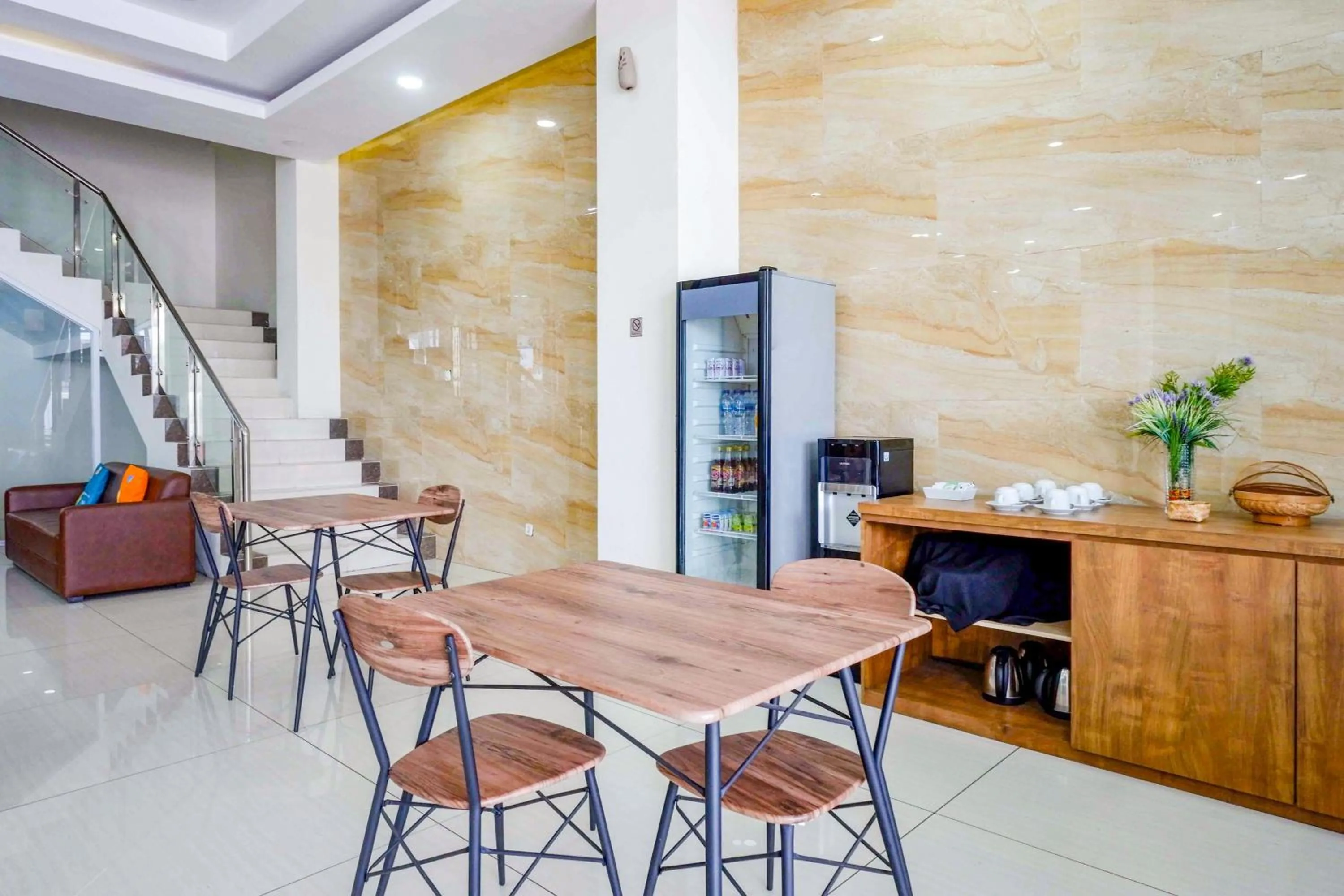 Seating area in Sans Hotel Nagari Malioboro