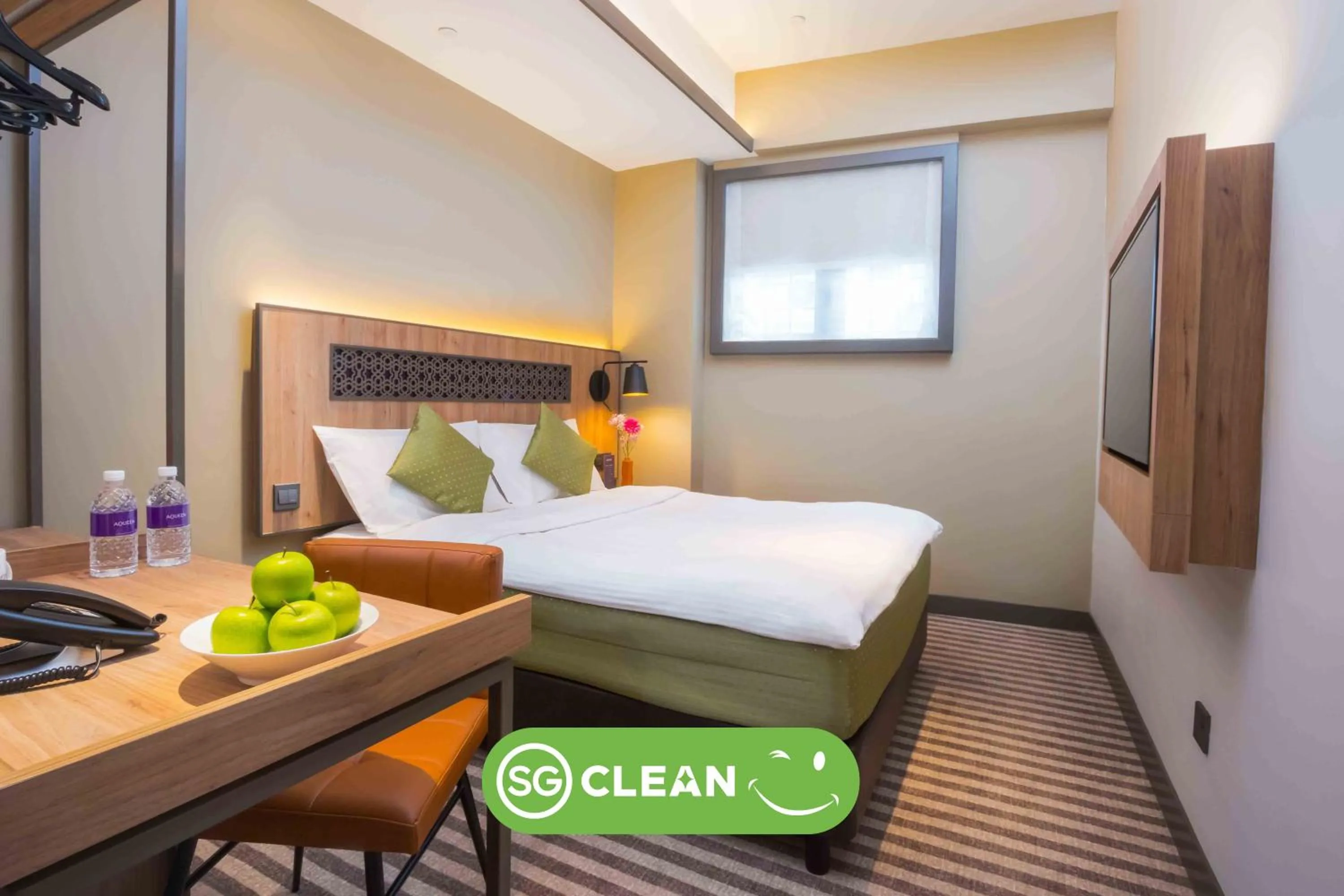 Bedroom in Aqueen Heritage Hotel Little India